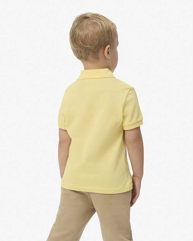 Polo Lacoste gialla in piqué di puro cotone image