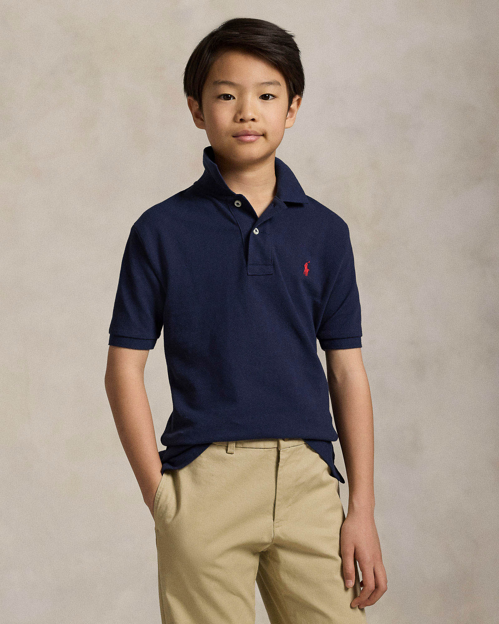 Polo blu Ralph Lauren a maniche corte in cotone con logo pony rosso