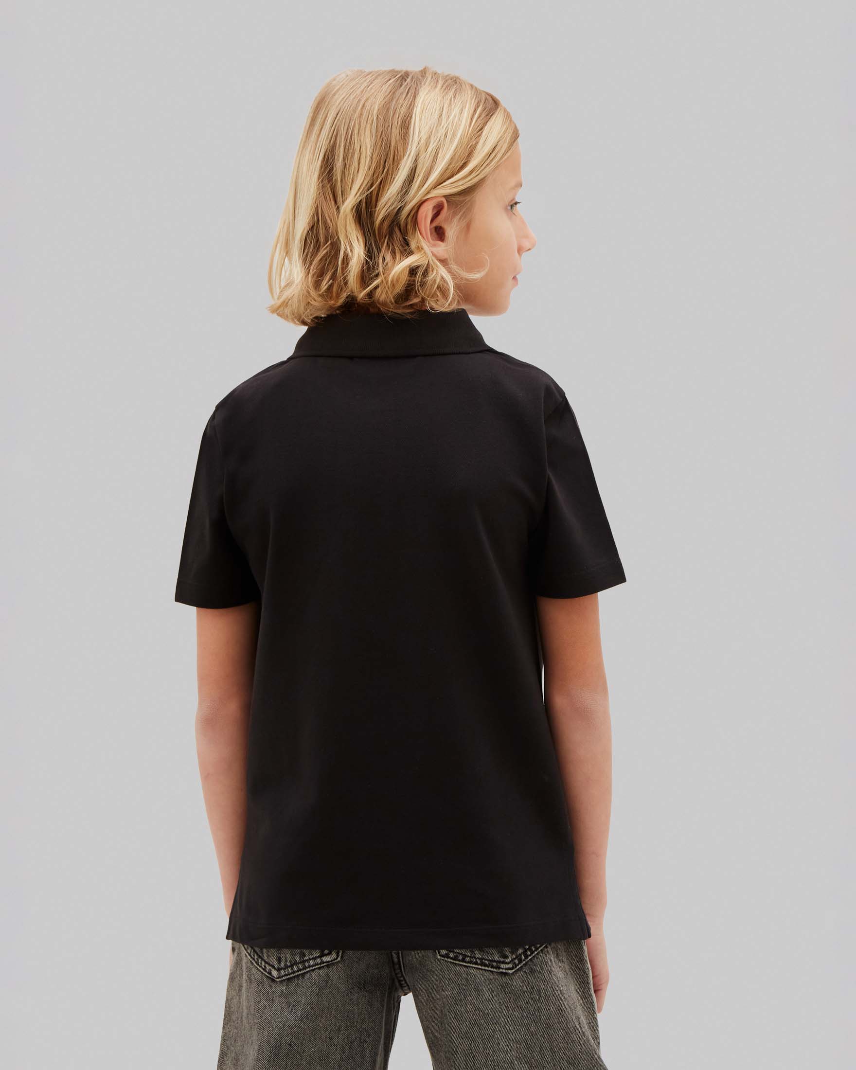 Polo mezza manica nera Calvin Klein in cotone stretch con logo bianco image