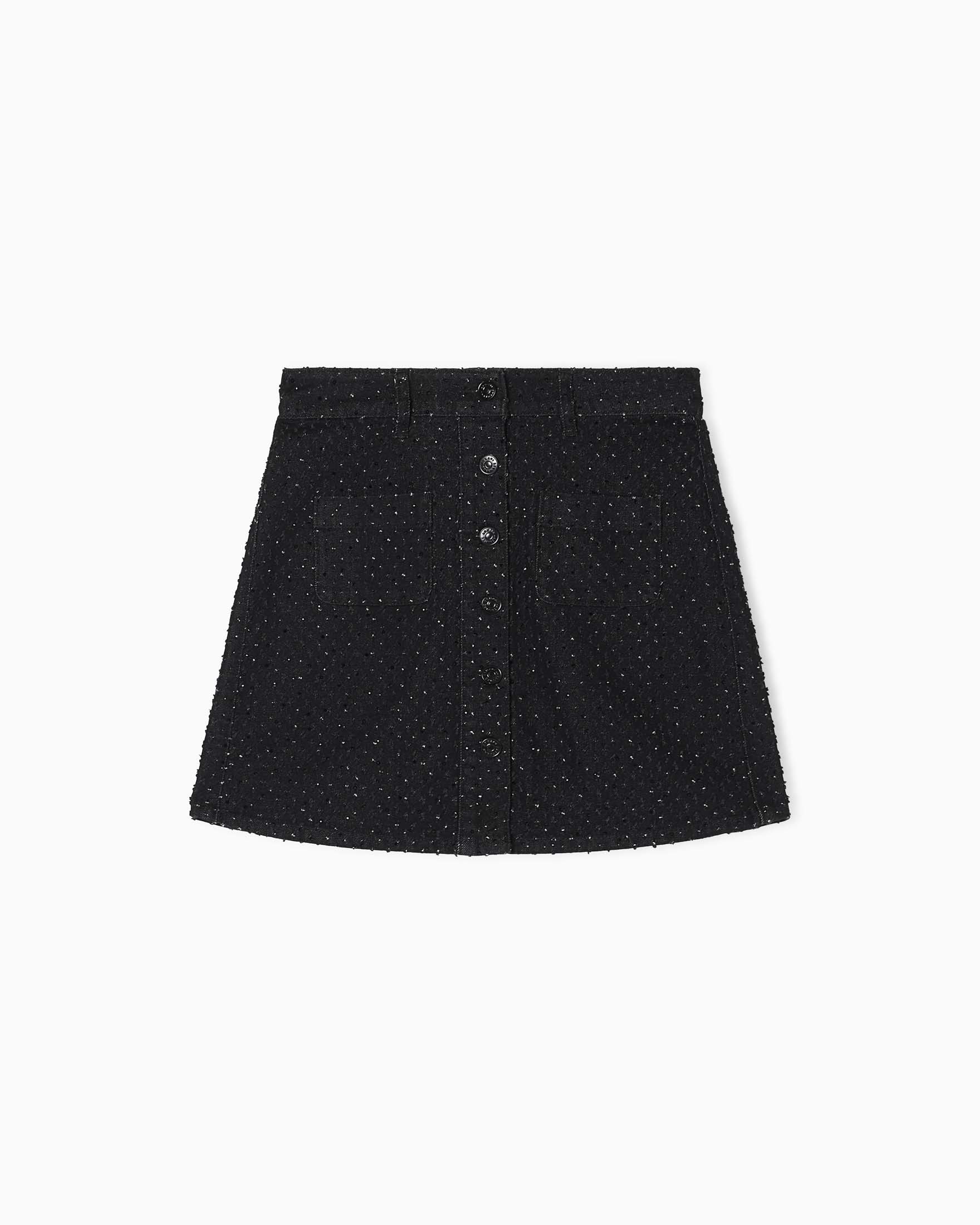 Gonna corta Exchange nera in denim misto cotone con tasche a toppa