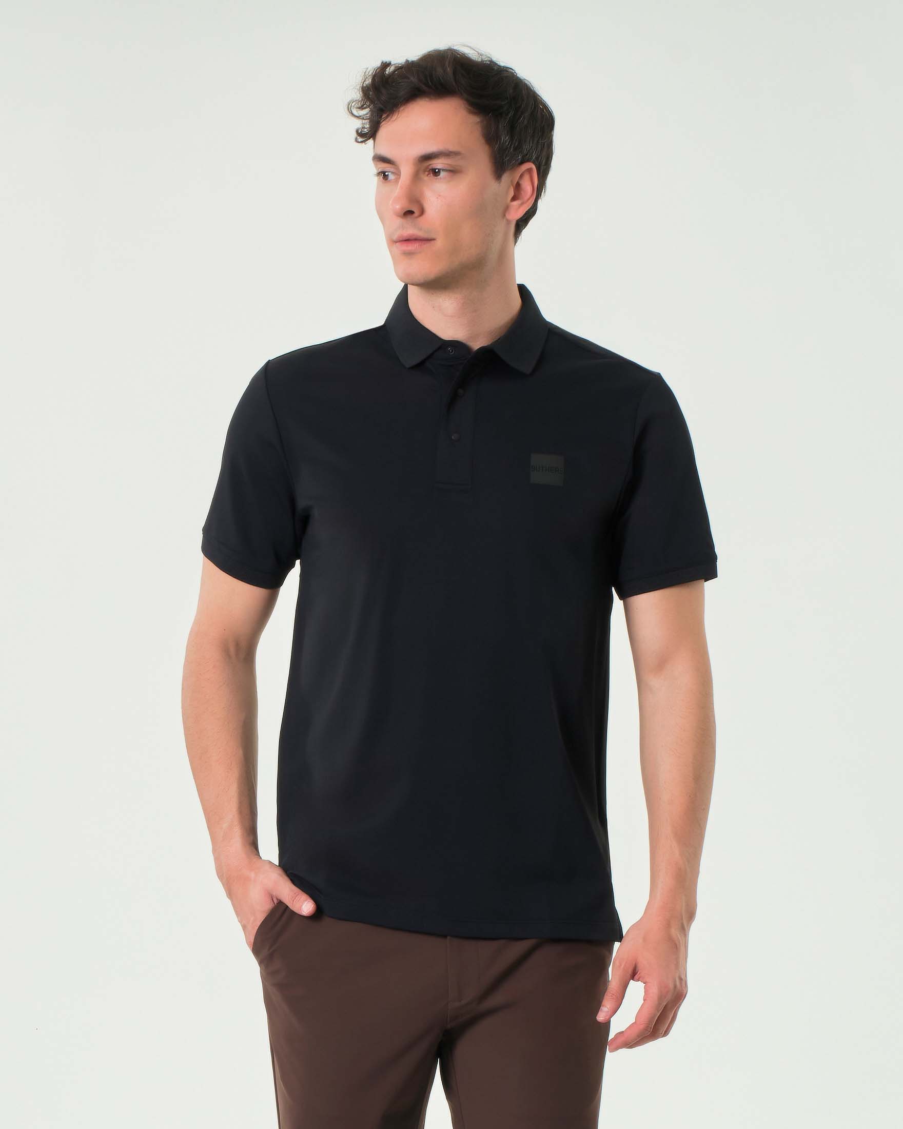 Polo Outhere nera in tessuto tecnico di micro piquè stretch