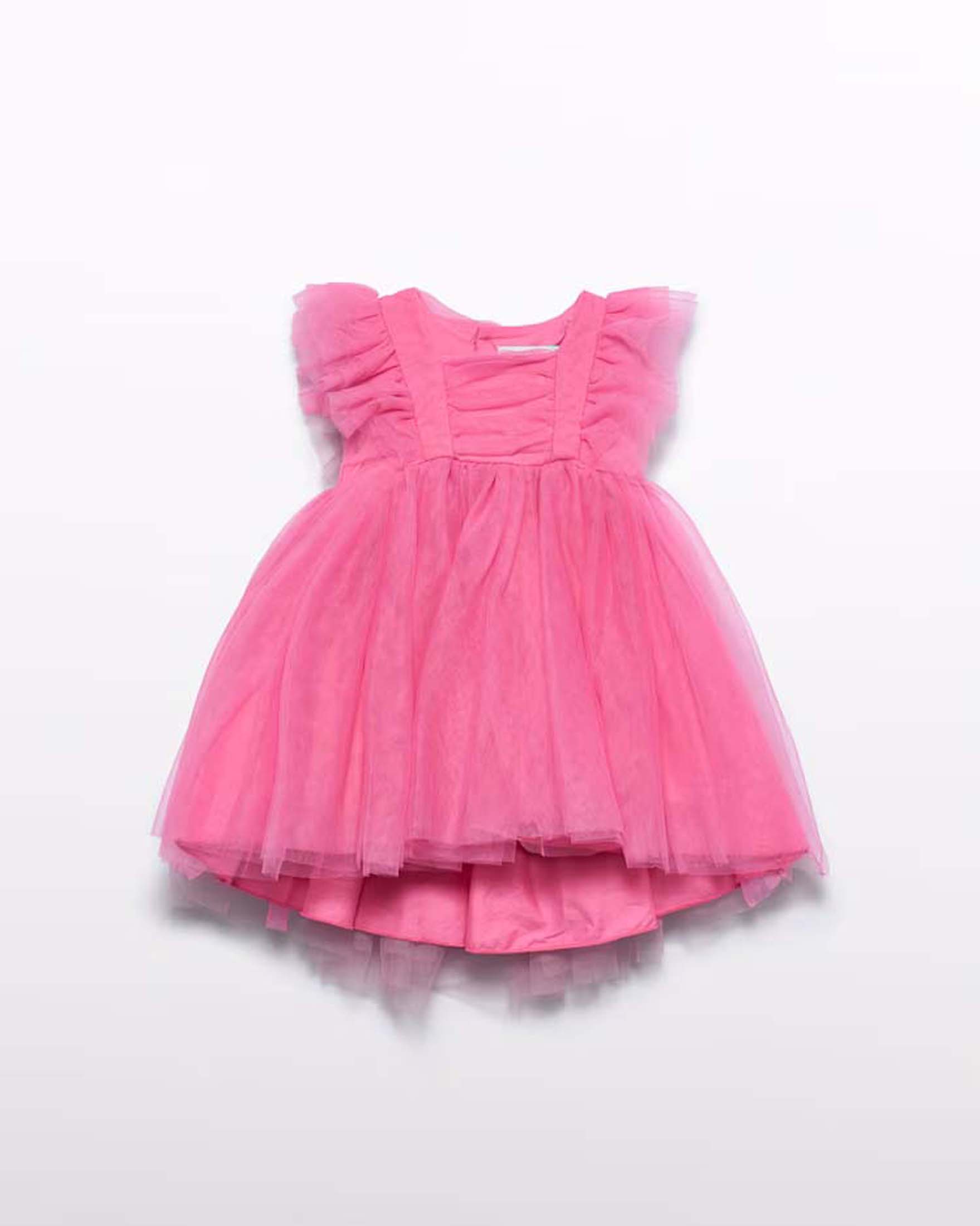 Abito fucsia in tulle con gonna asimmetrica
