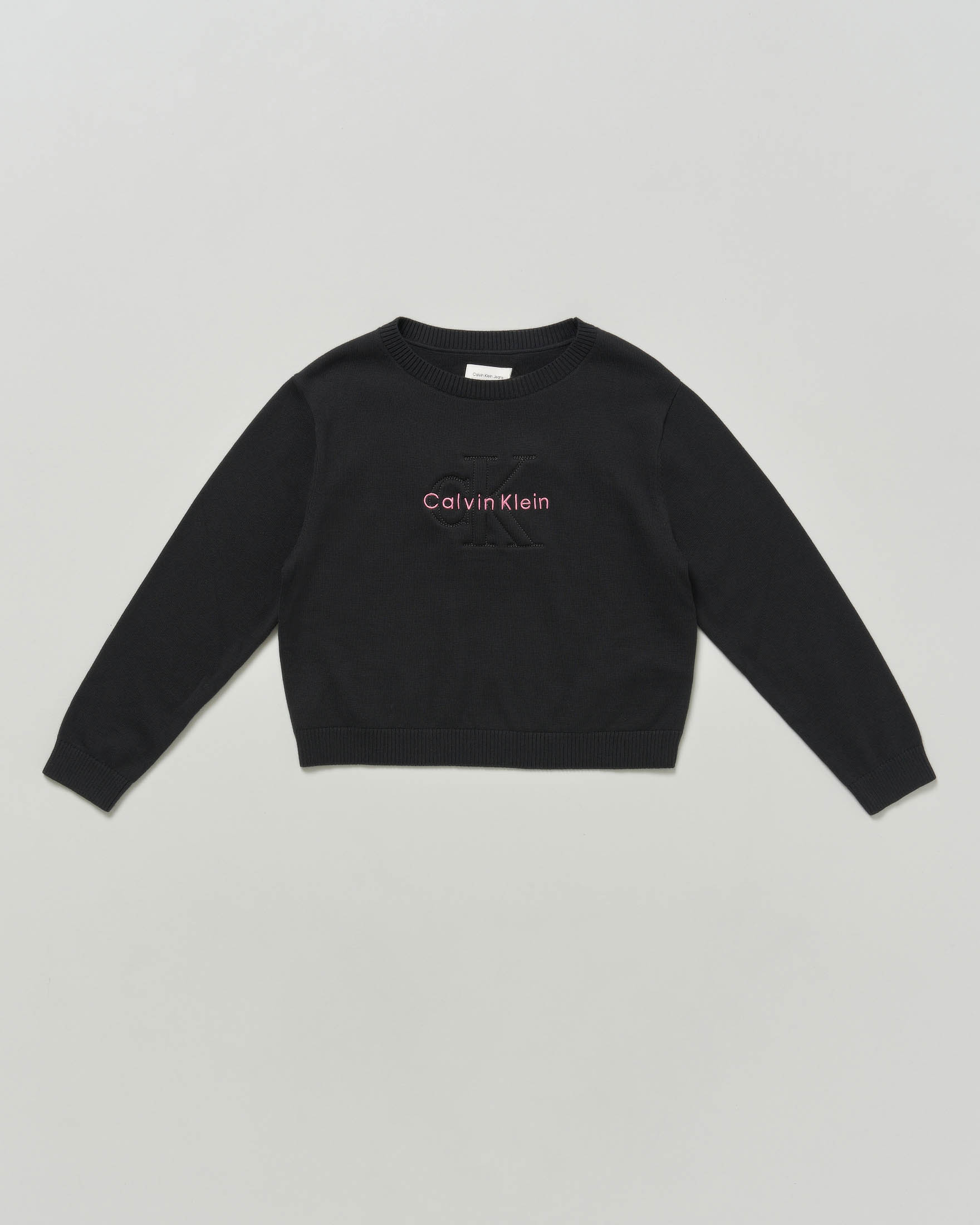 Maglia nera Calvin Klein in cotone tricot con scritta logo rosa