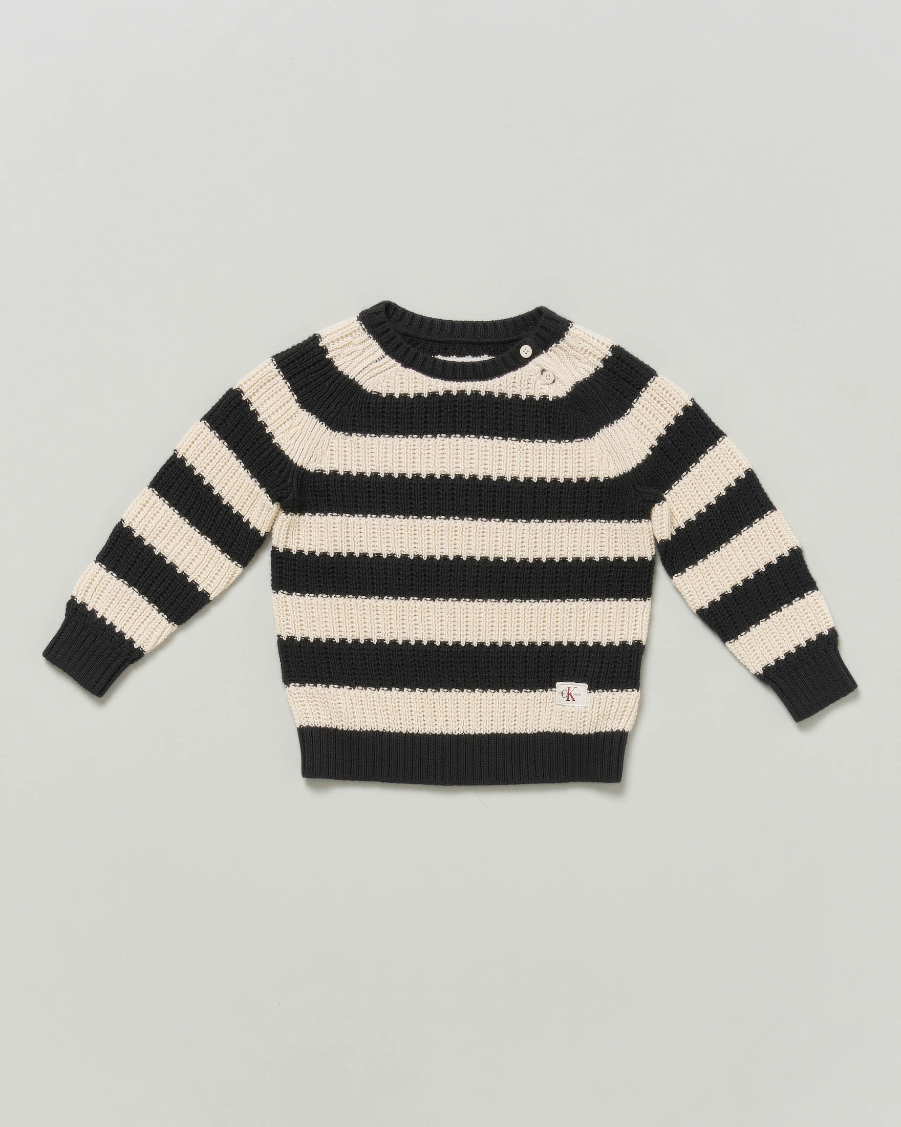 Maglioncino Calvin Klien a righe nero e panna
