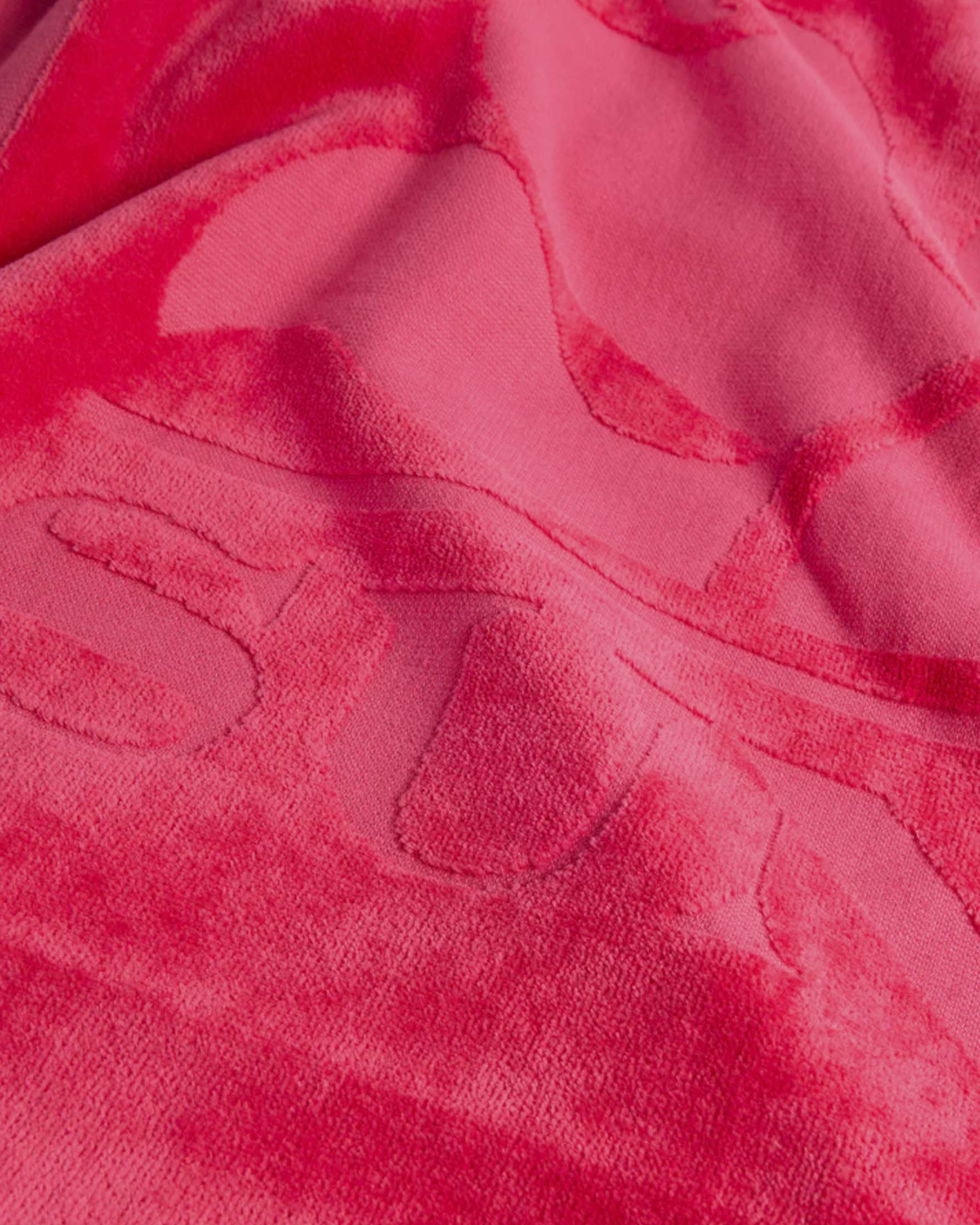 Telo mare Sundek fucsia con maxi logo a contrasto e profili arcobaleno image