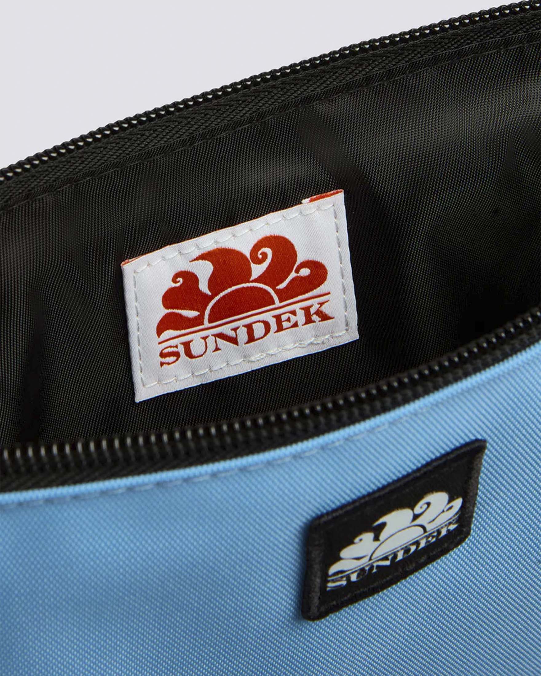 Mini busta Sundek in gomma rigida azzurra con zip e asola passamano a contrasto image