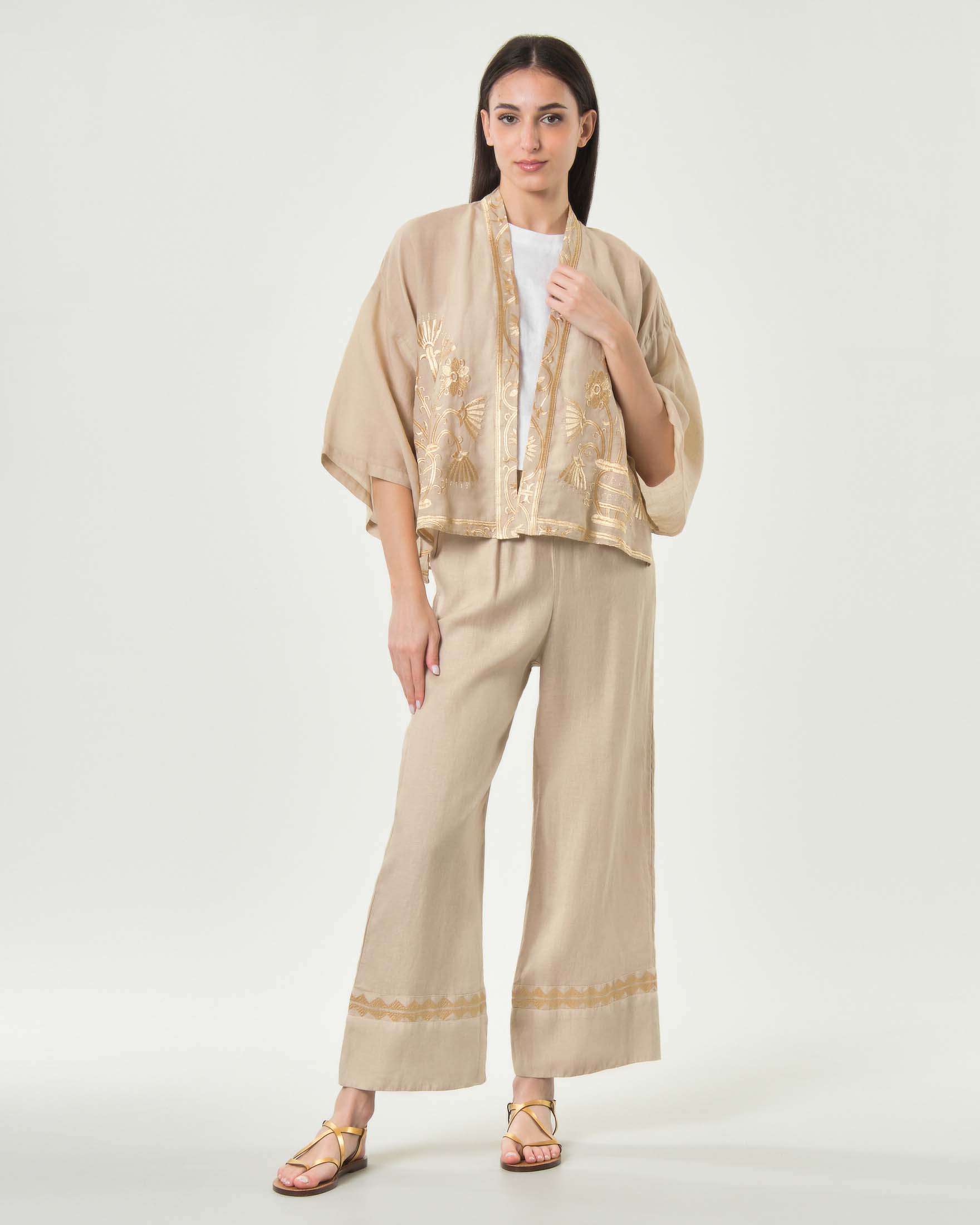Pantaloni palazzo Greek Archaic Kori beige in lino con orlo ricamato in filo oro e vita elasticizzata