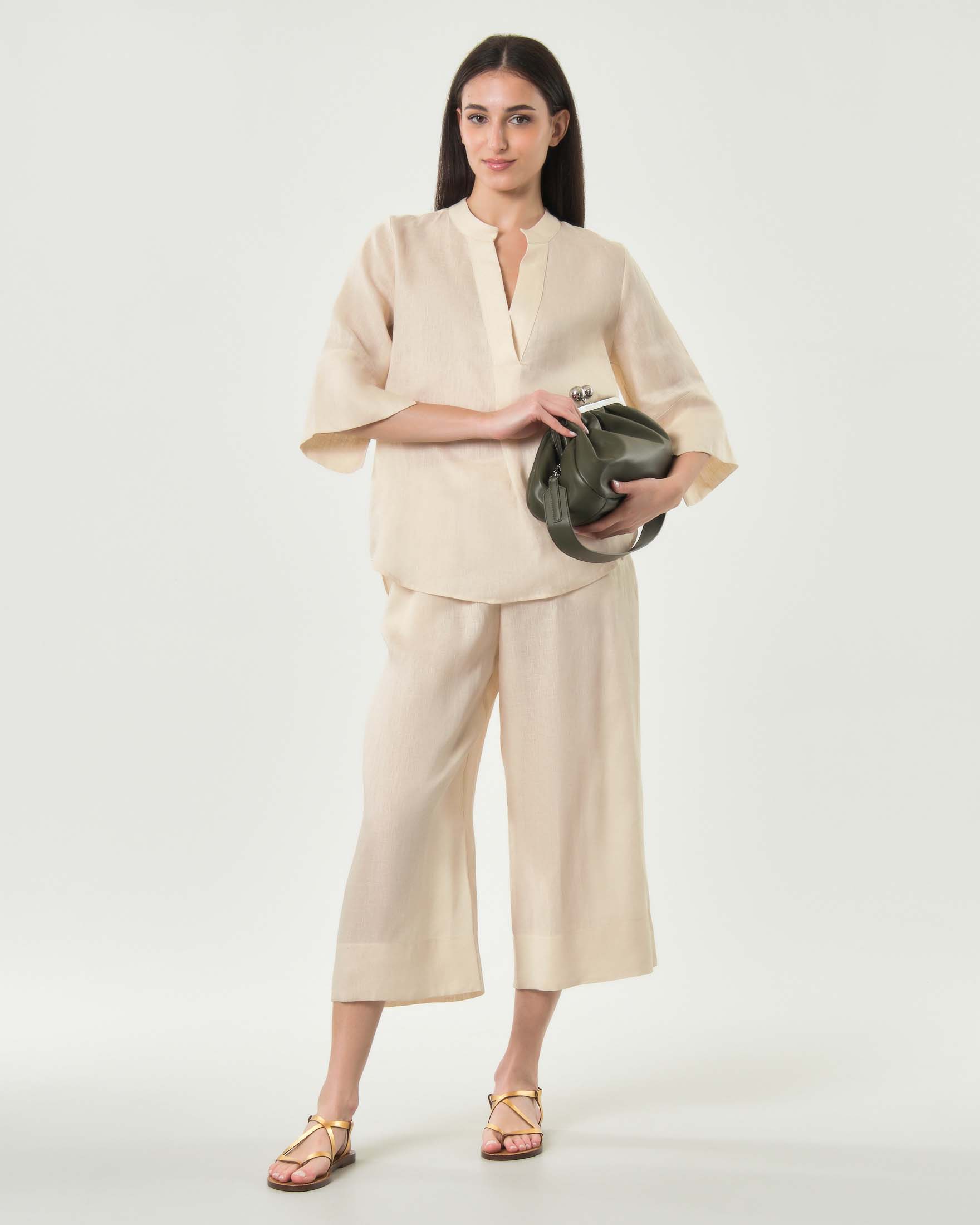 Pantaloni cropped Greek Archaic Kori avorio in puro lino con tasche laterali e vita elasticizzata