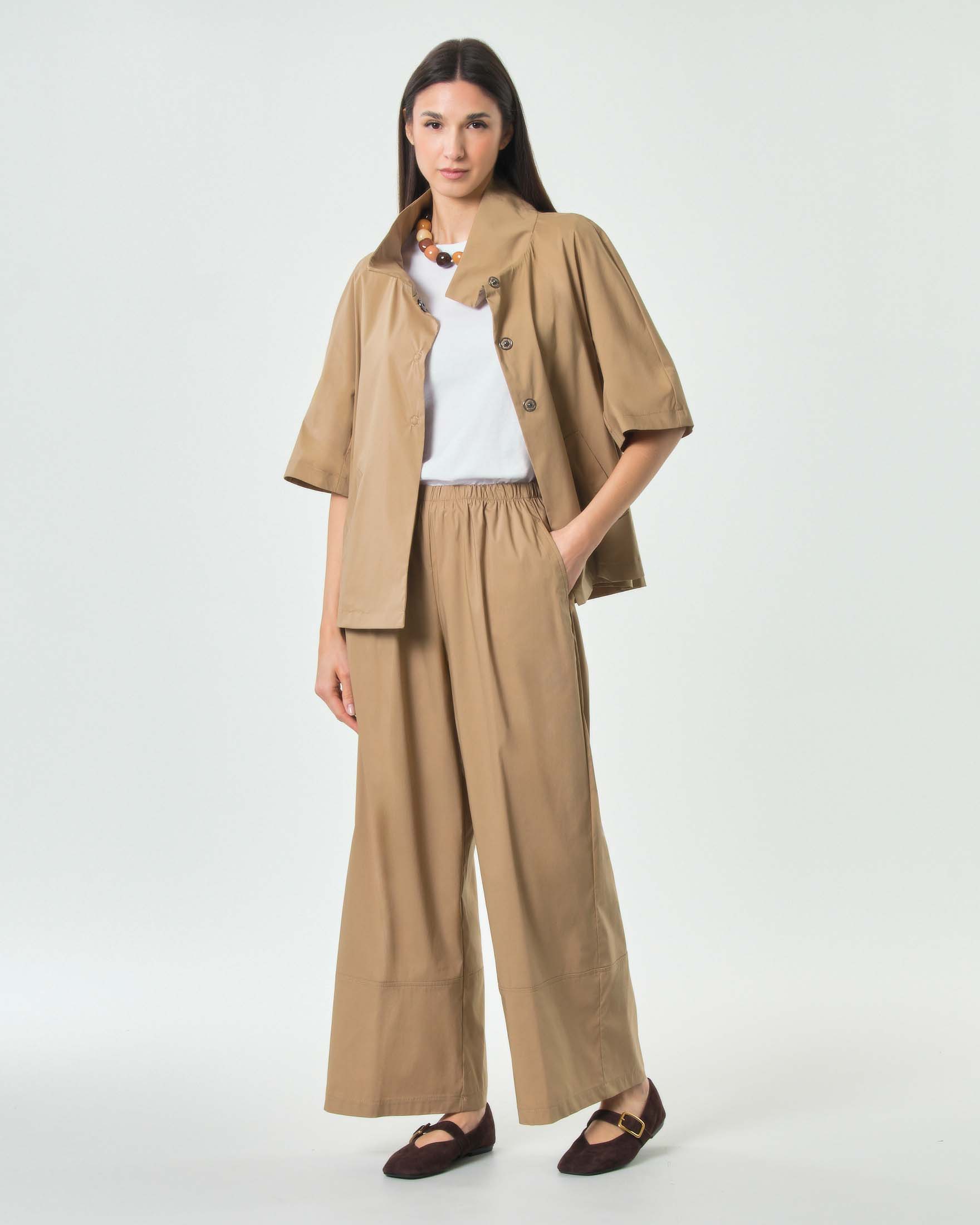 Pantaloni beige Jurerê in popeline di cotone stretch dalla linea wide con elastico in vita