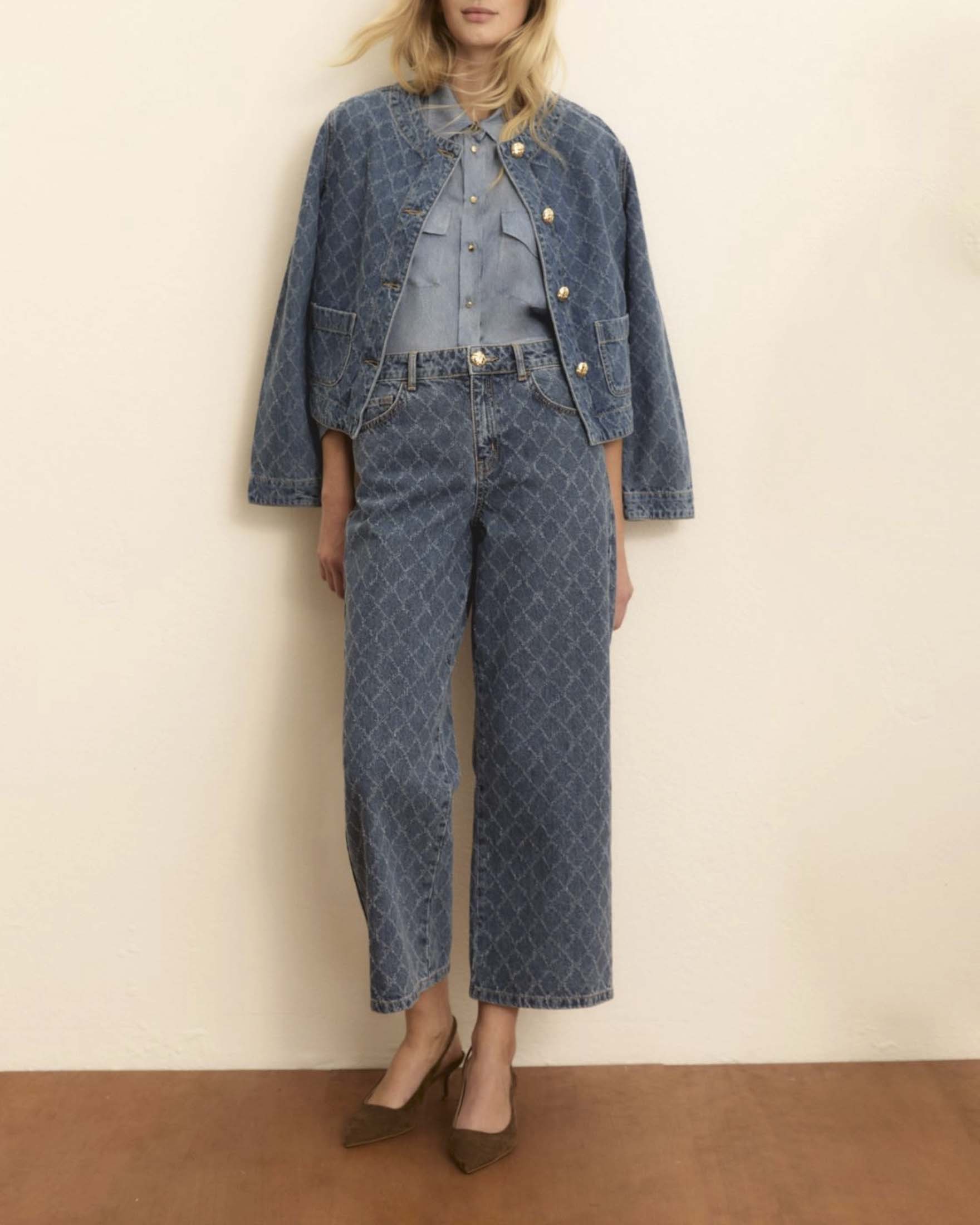 Pantaloni 5 tasche Emme Marella in denim con lavorazione laserata a rombi e lavaggio stonewash
