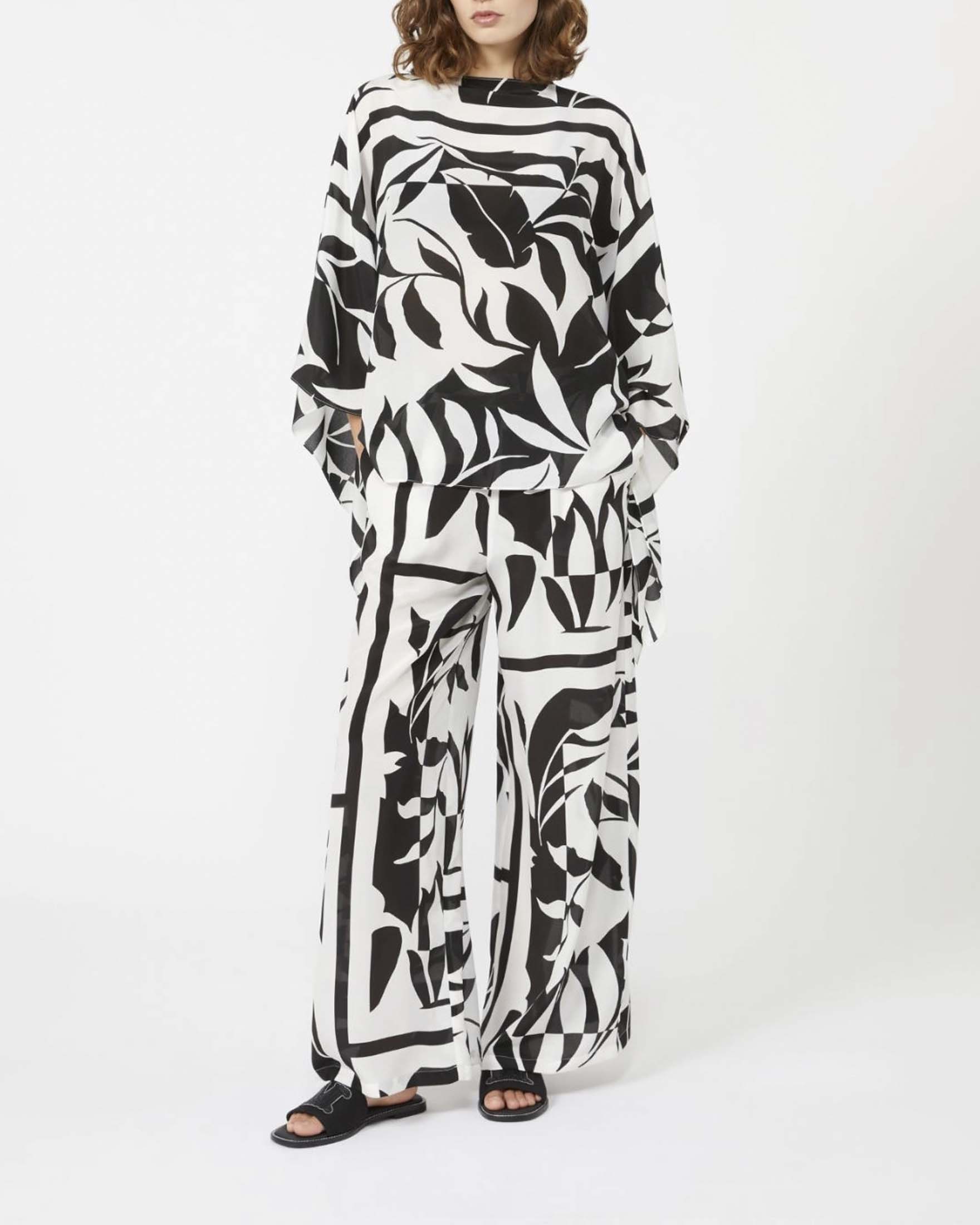 Pantaloni a palazzo Max Mara Beachwear bianco in seta stampata a contrasto