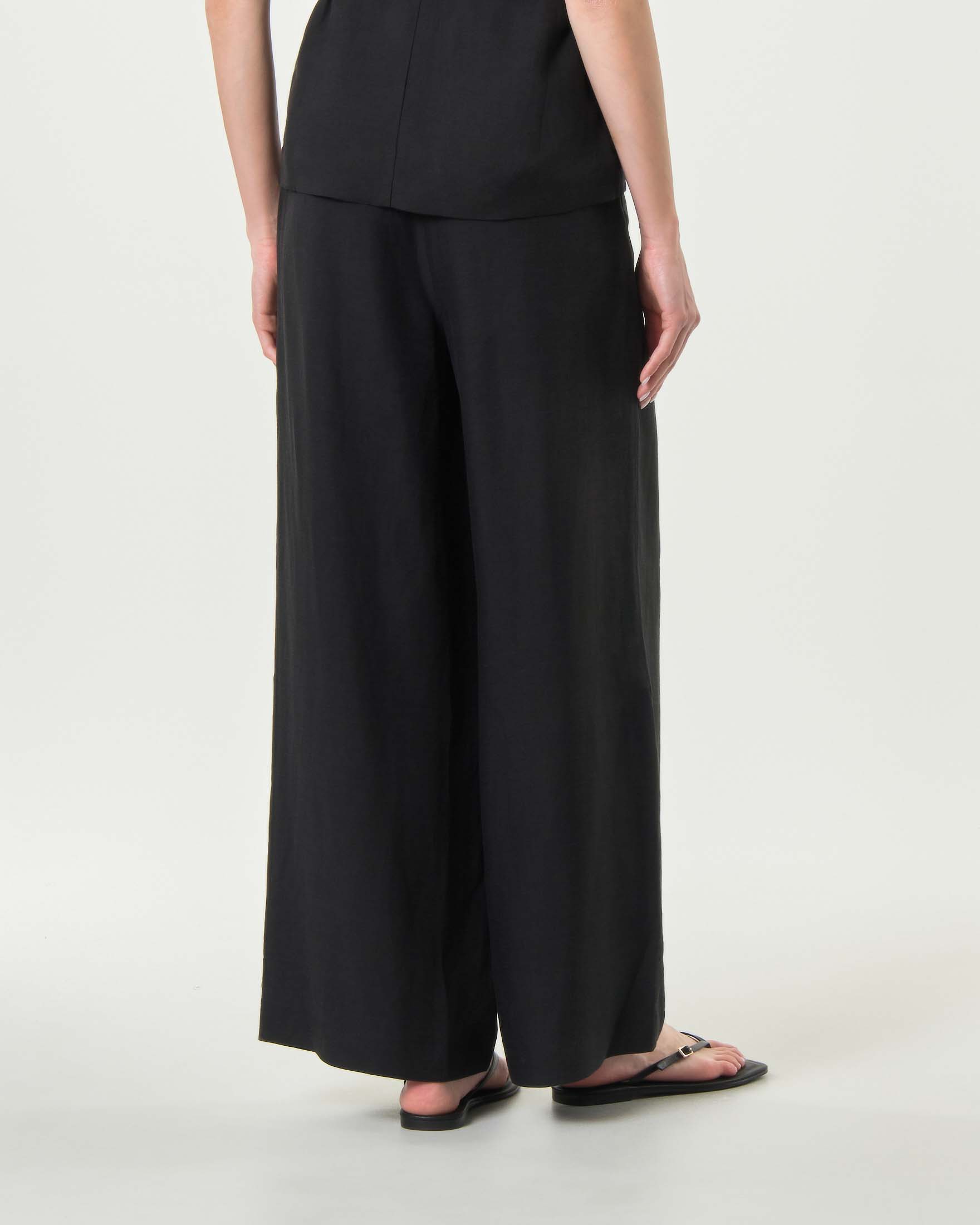 Pantalone a palazzo Milla neri con pince e chiusura zip