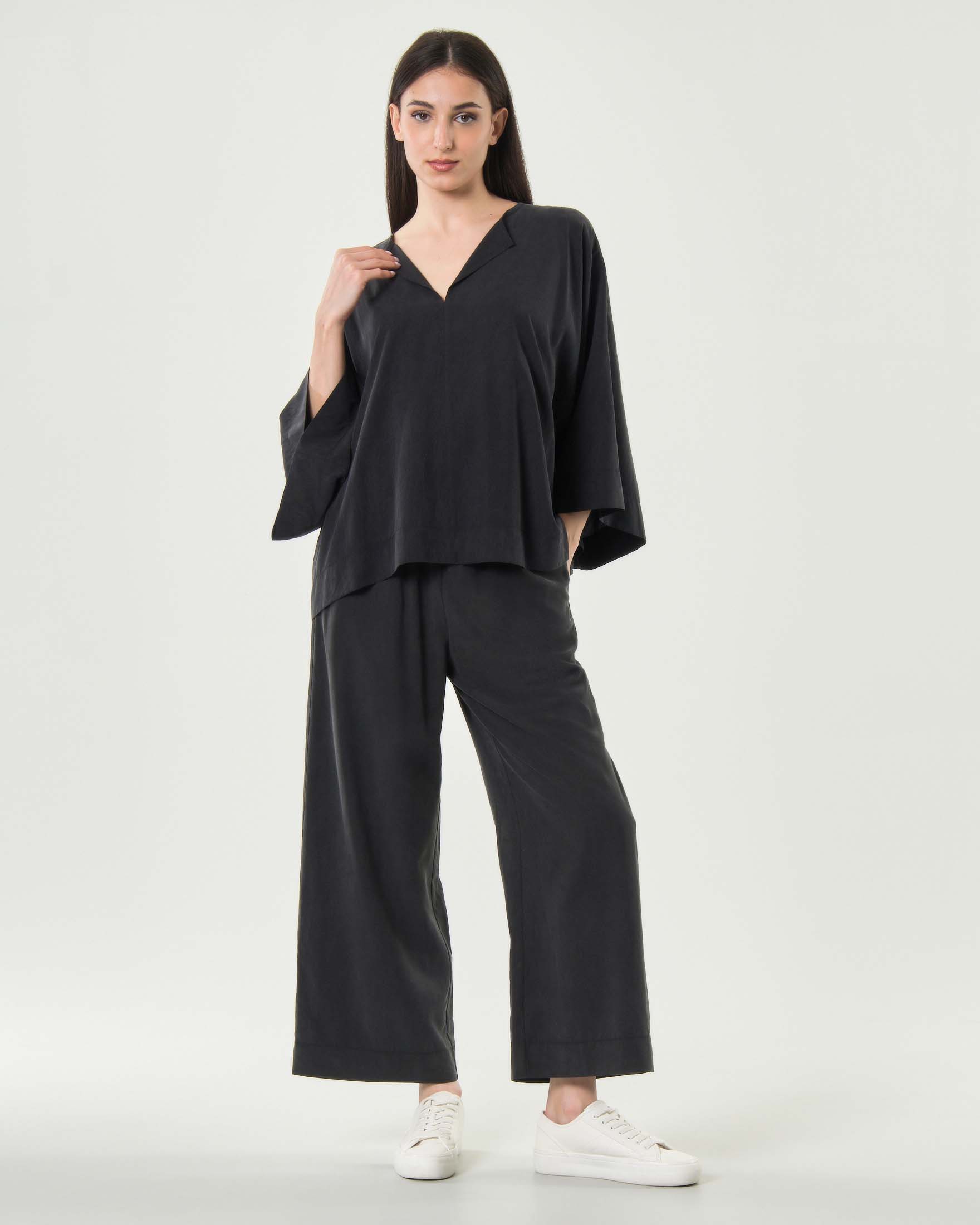 Pantaloni dritti Milla neri in tencel con vita elasticizzata e tasche laterali