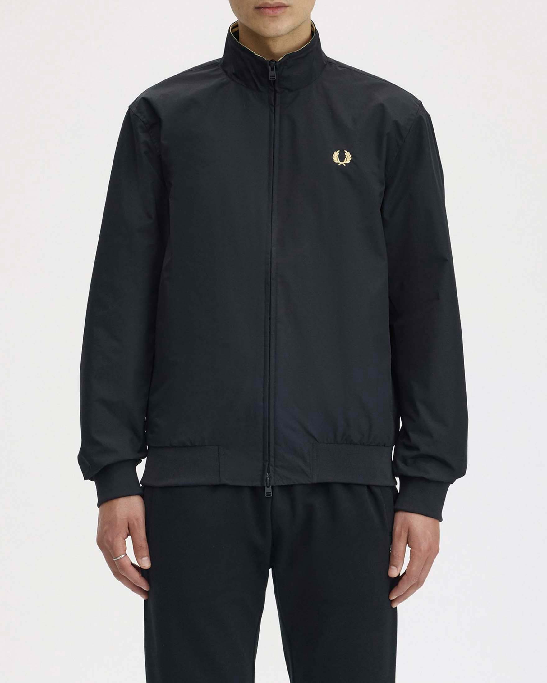 Giubbino sailor nero in twill con corona d'alloro color oro ricamata sul petto