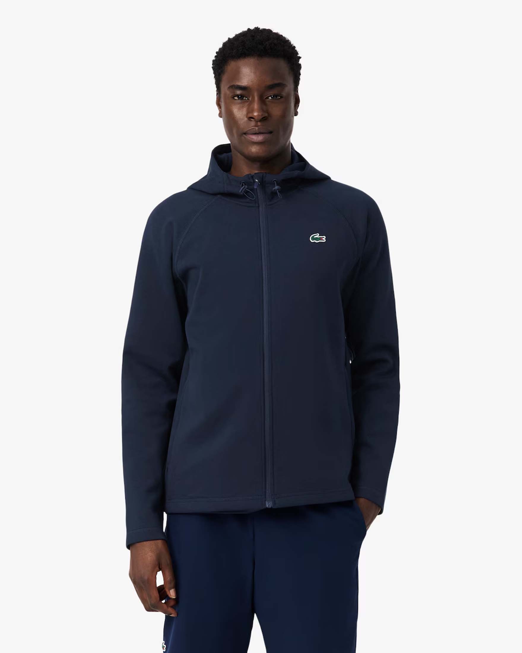 Felpa Lacoste in interlock blu con cappuccio chiusura zip e logo coccodrillo ricamato sul petto