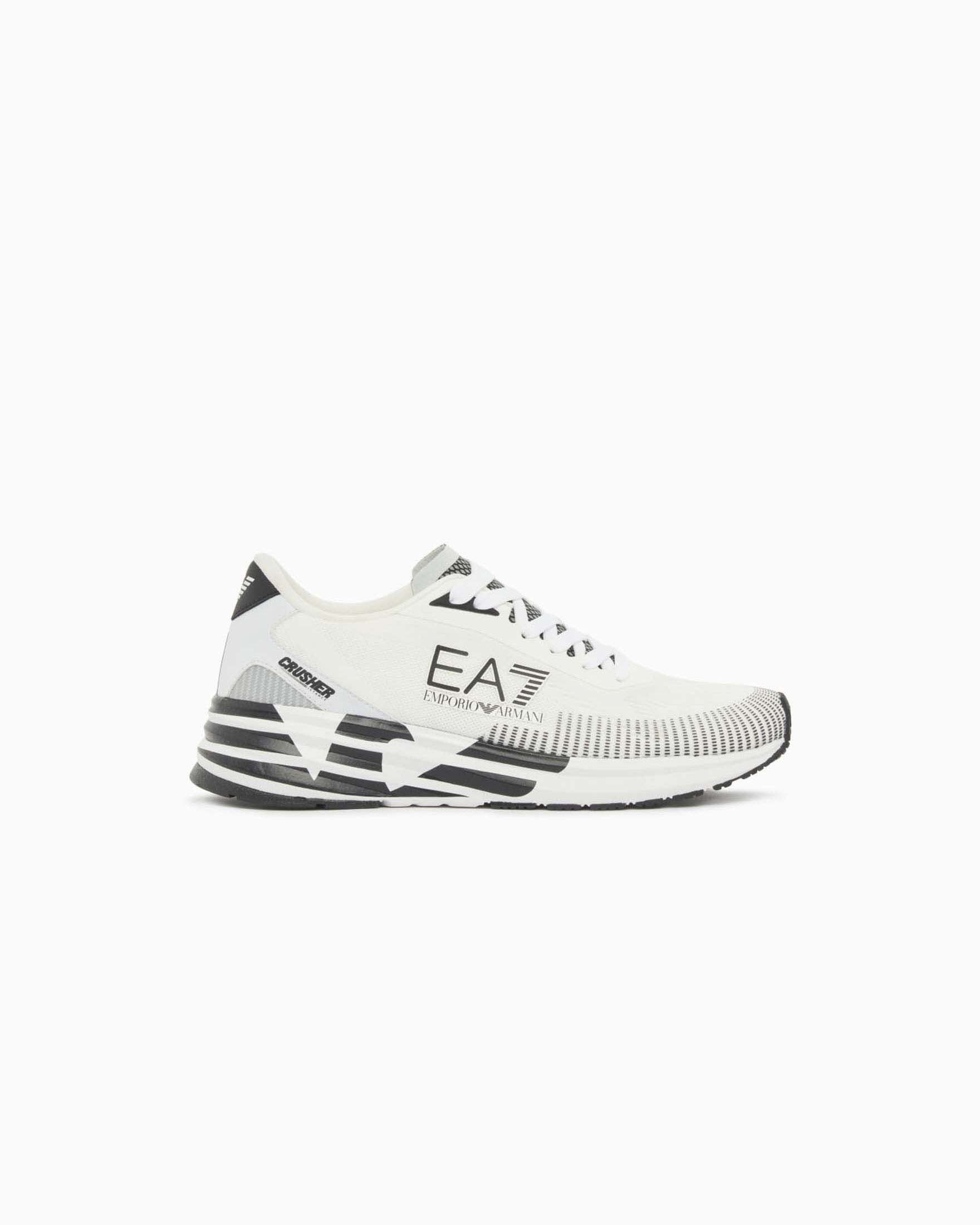 Sneakers bianche in mesh con logo stampato