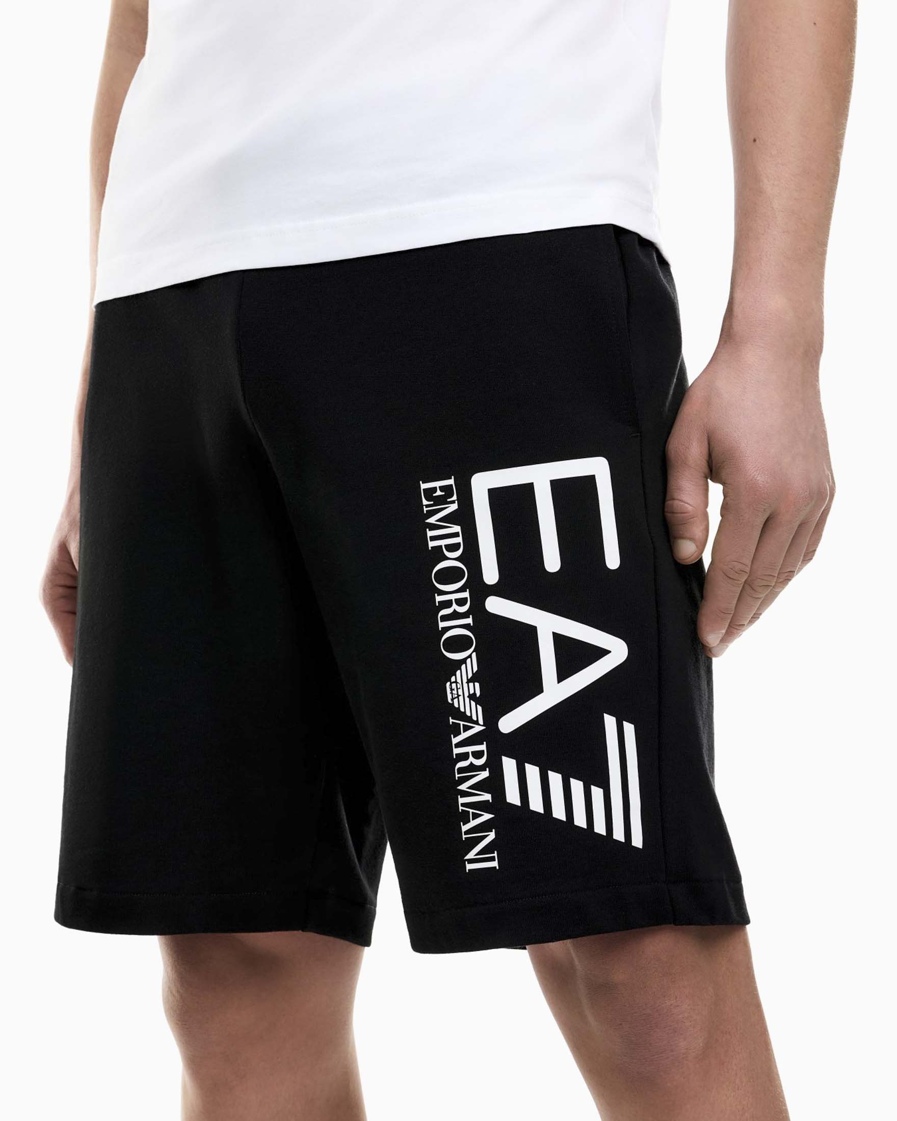 Bermuda EA7 neri in felpa di cotone con maxi logo stampato image