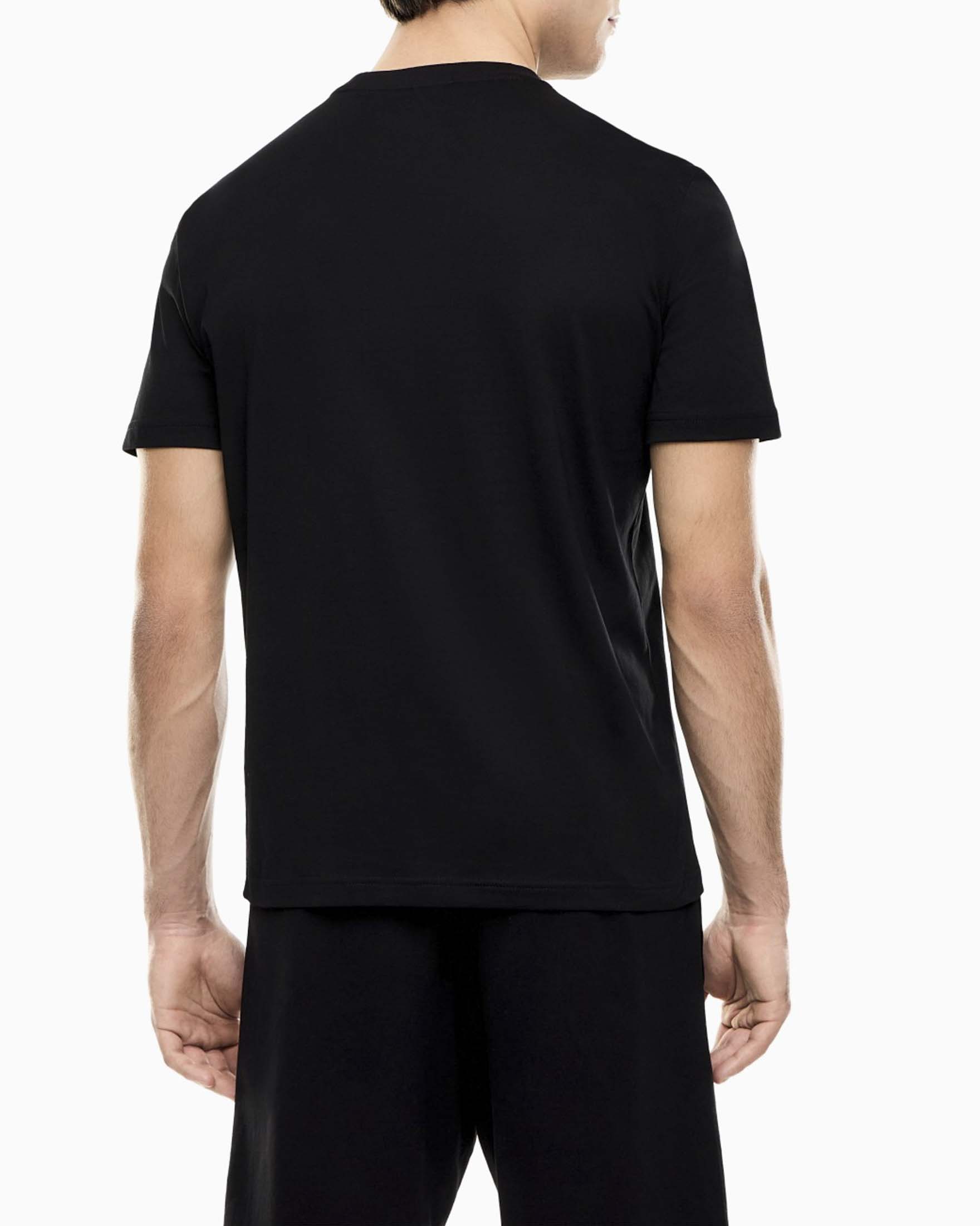 T-shirt EA7 nera in cotone a maniche corte con stampa logo image