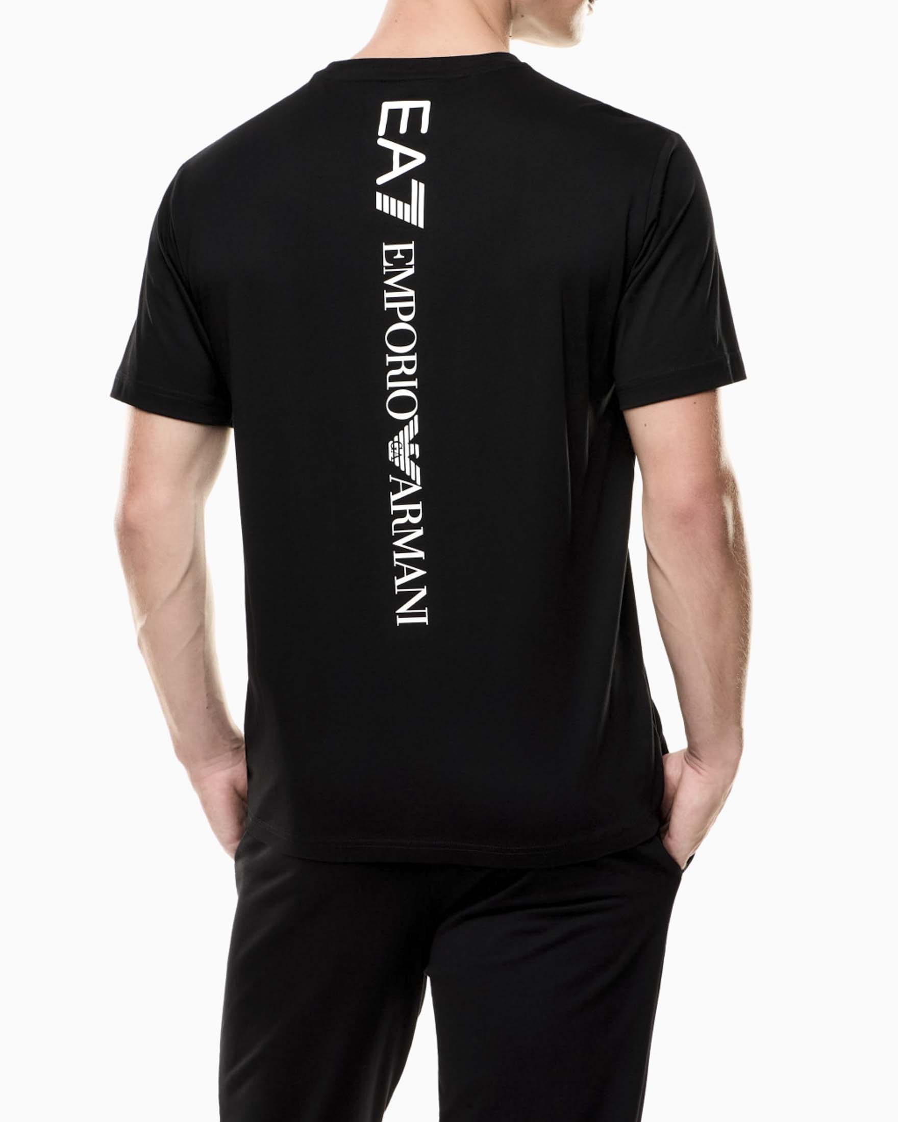 T-shirt EA7 nera in cotone a maniche corte con stampa logo sul retro image