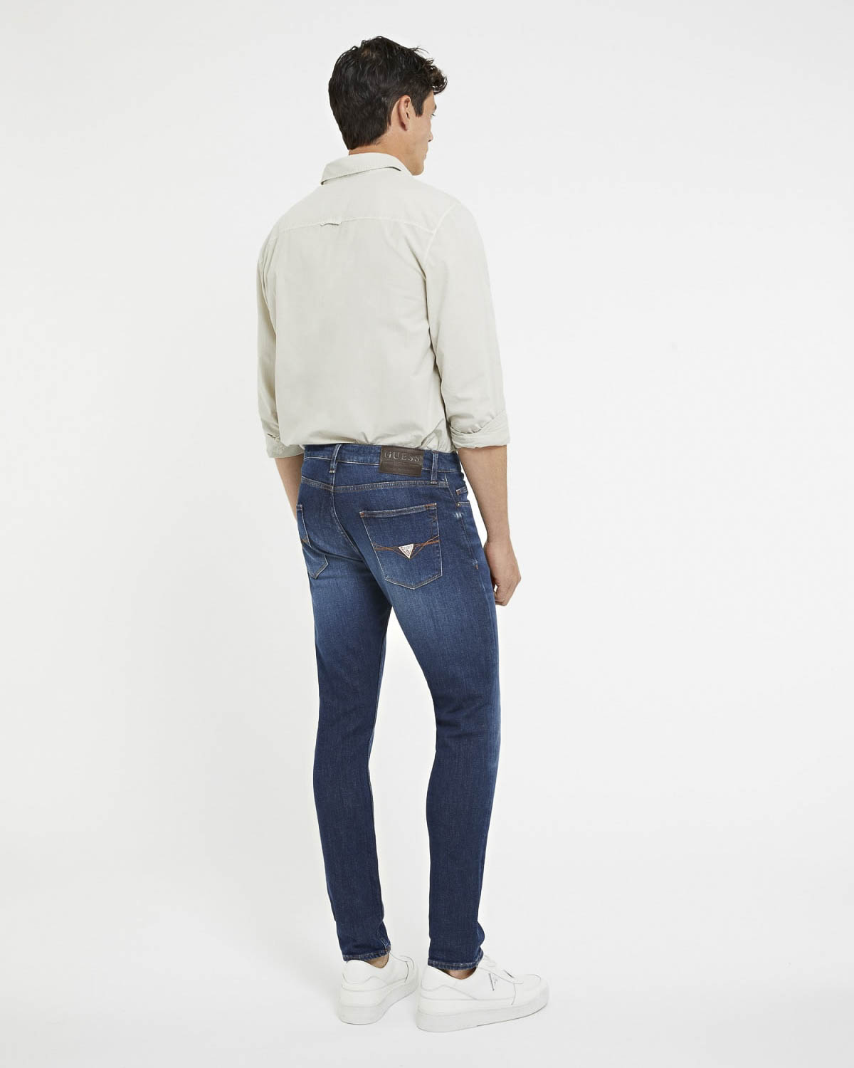 Jeans slim-fit Guess lavaggio scuro in misto cotone image