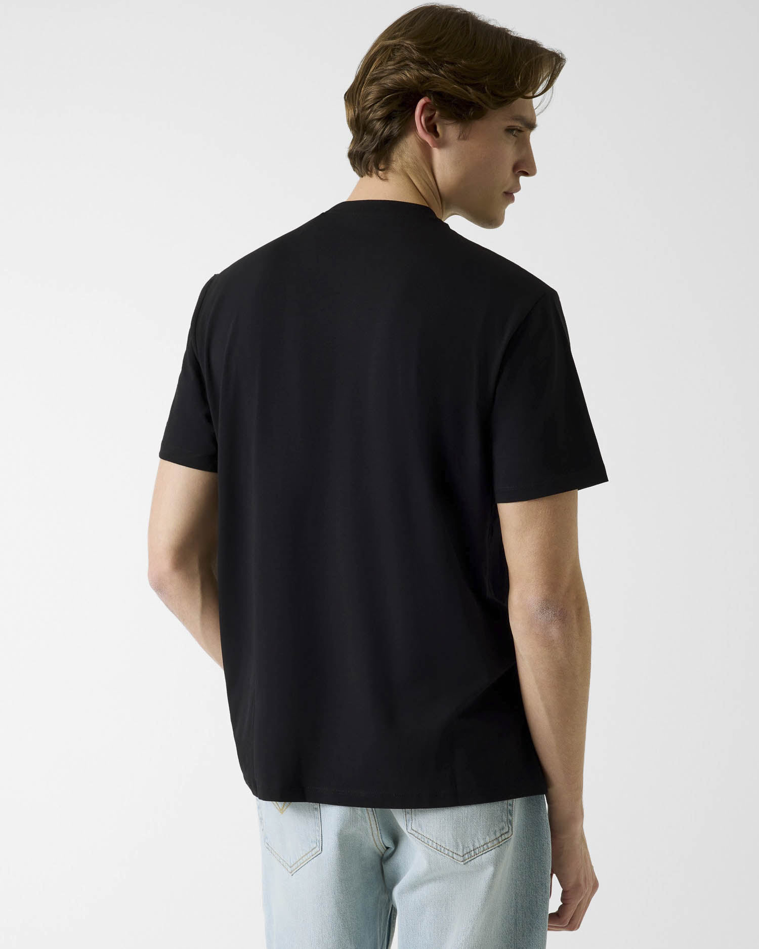 T-shirt mezza manica Guess nera in misto cotone e modal stretch image