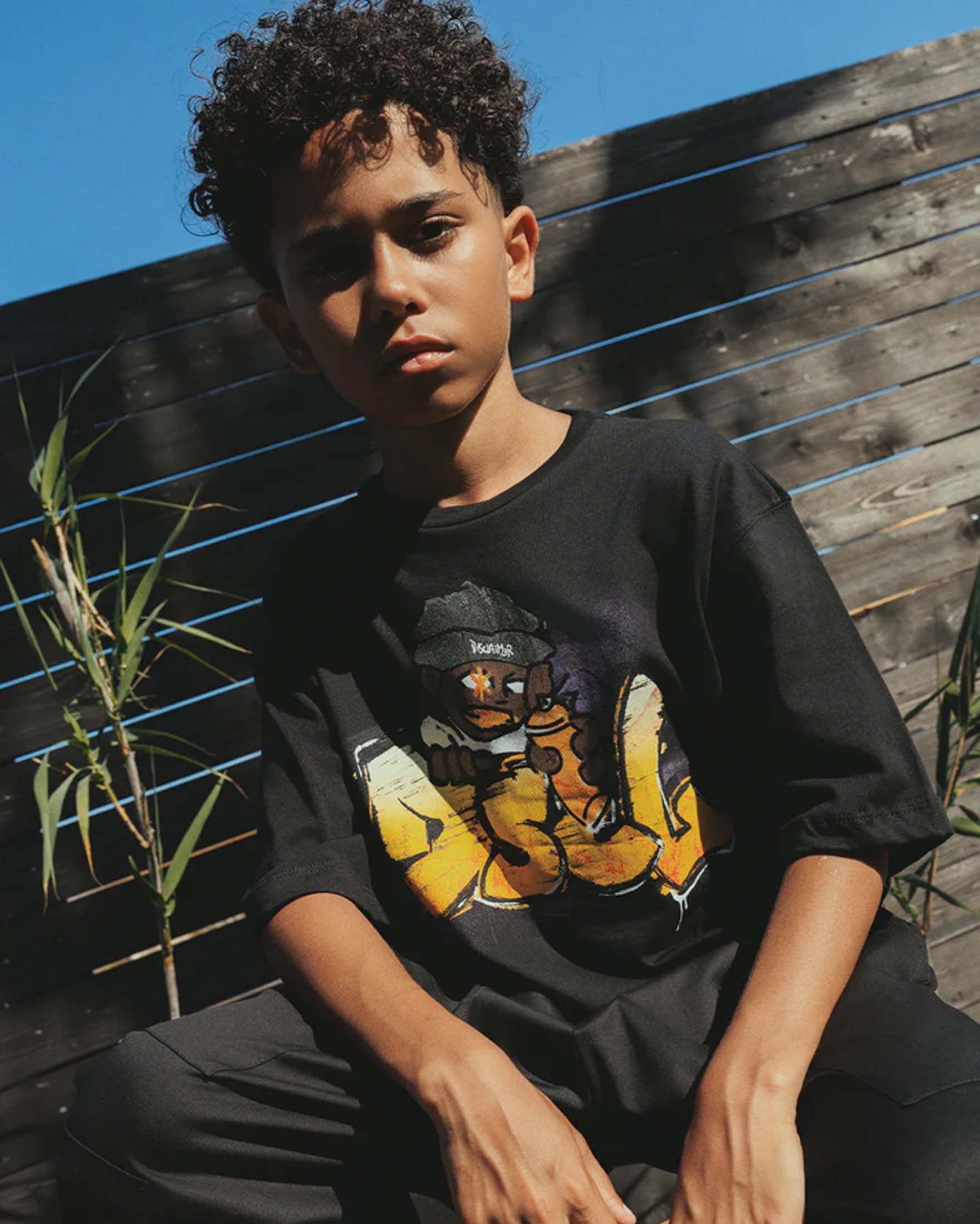 T-shirt nera Disclaimer in puro cotone con stampa writer image