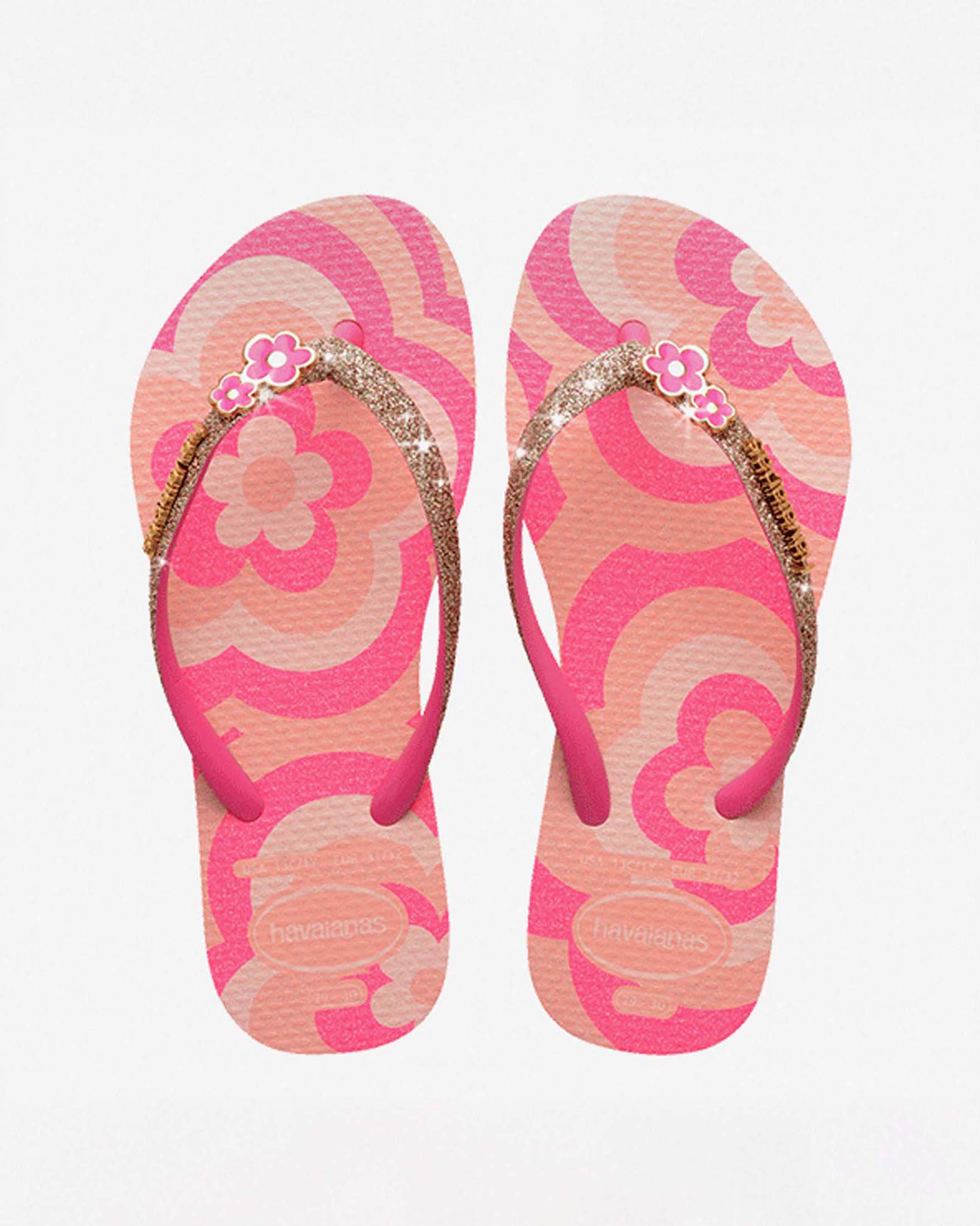 Havaianas Kids Slim rosa con fantasia fiori e fascetta glitterata
