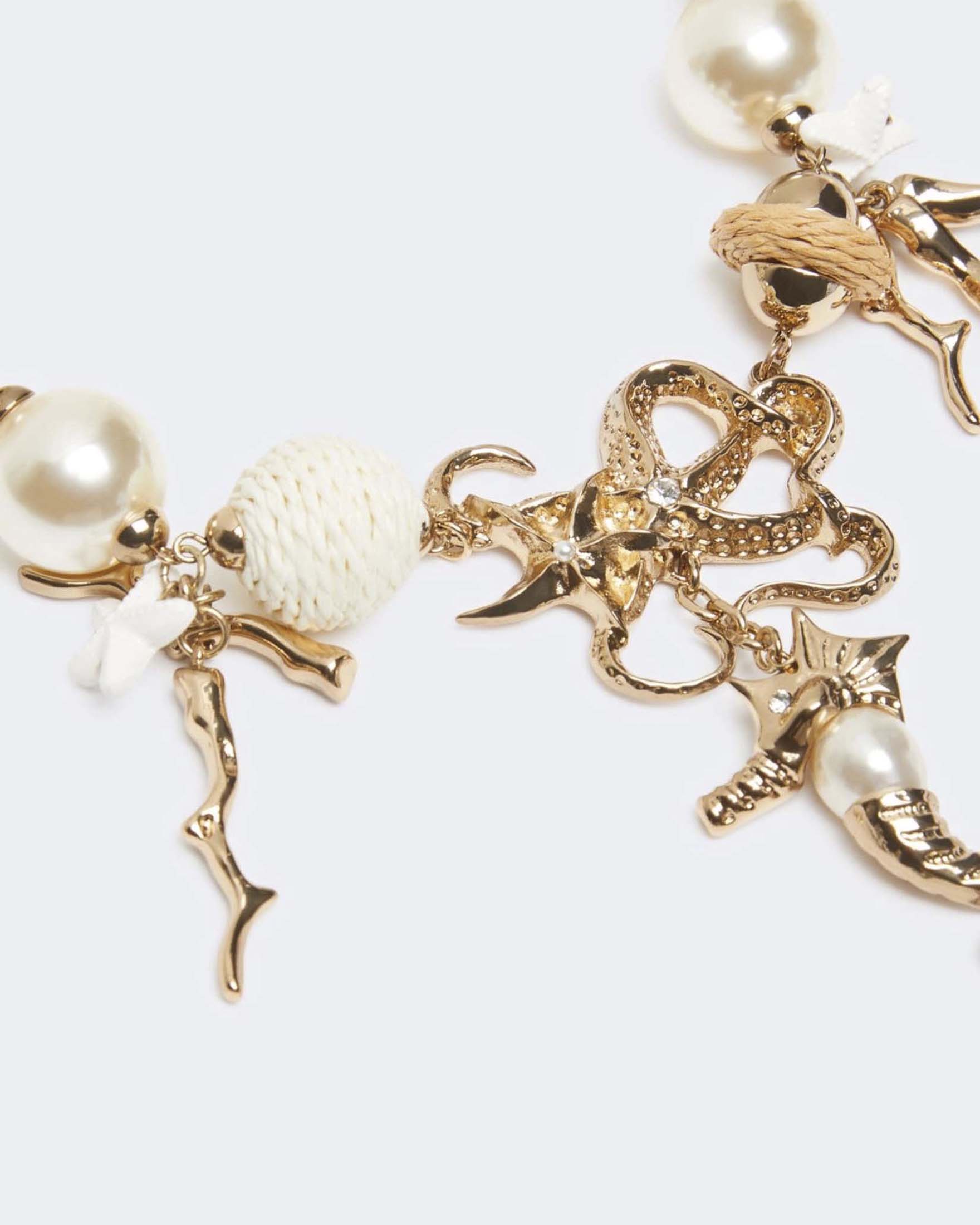 Collana girocollo Weekend Max Mara Abissi ini catena dorata con ciondoli marini e rafia intrecciata image
