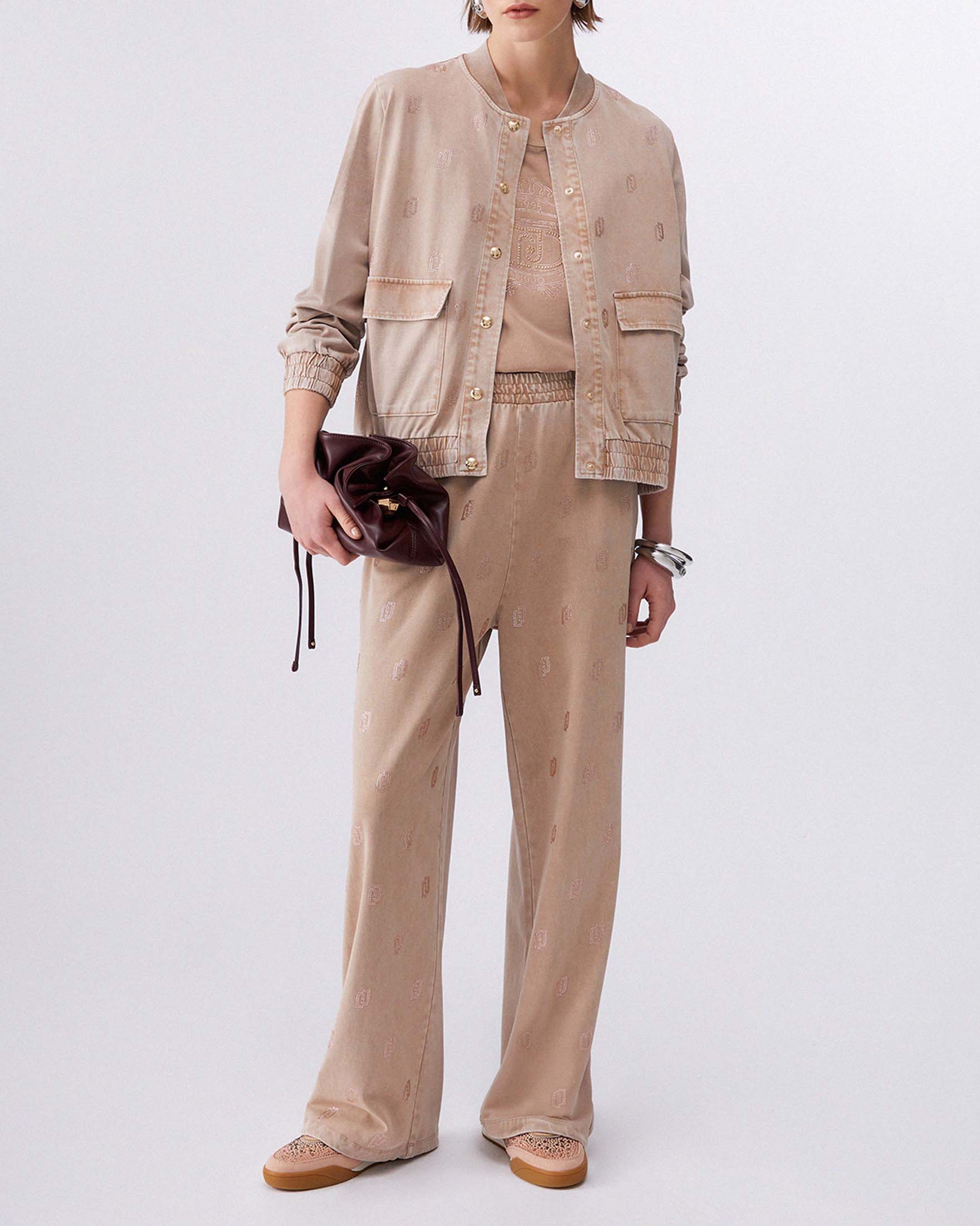 Bomber jacket Liu Jo Sport color nude in jersey délavé con logo strass all over e tasche applicate