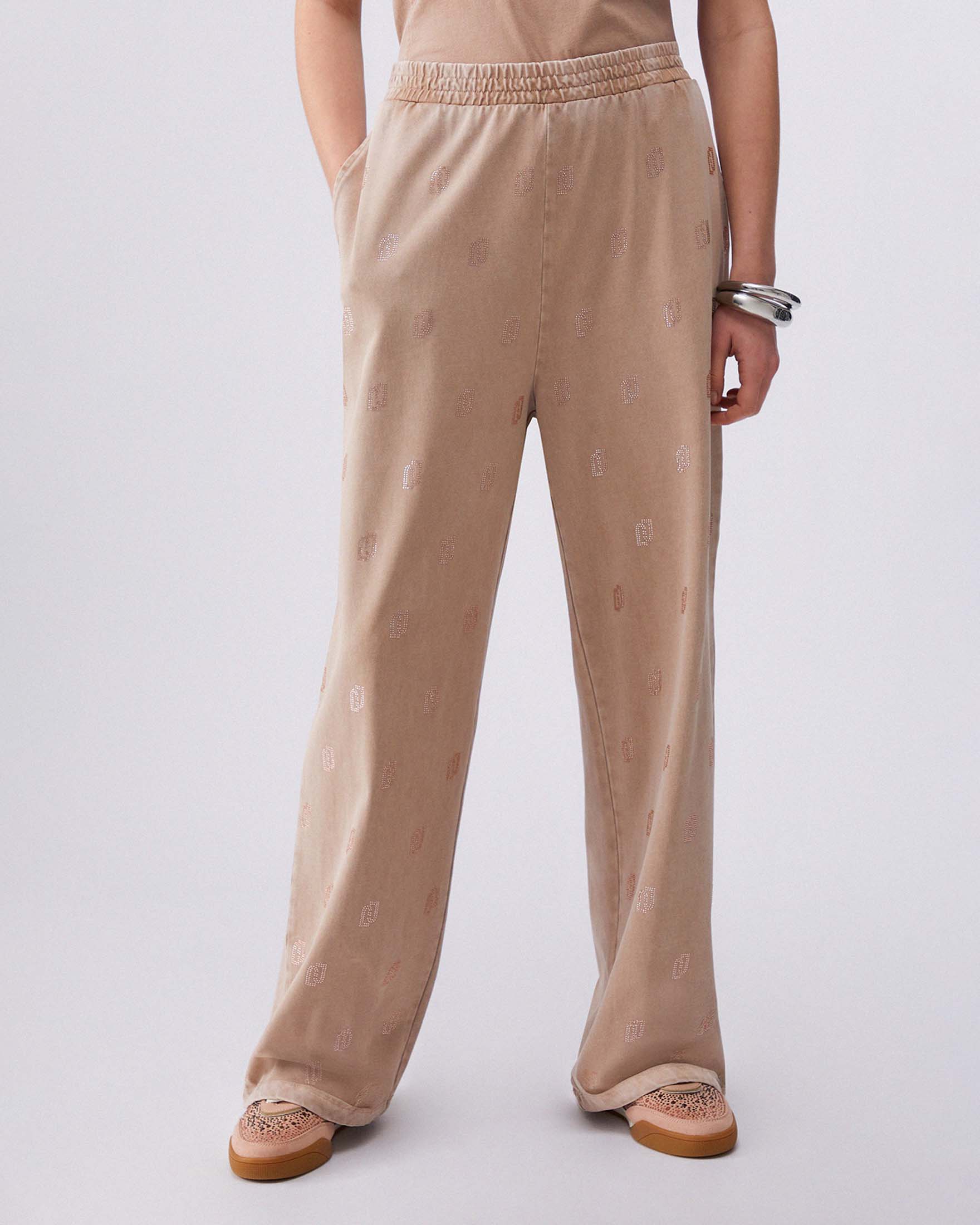 Pantaloni wide Liu Jo Sport color nude in jersey délavé con logo strass all over image
