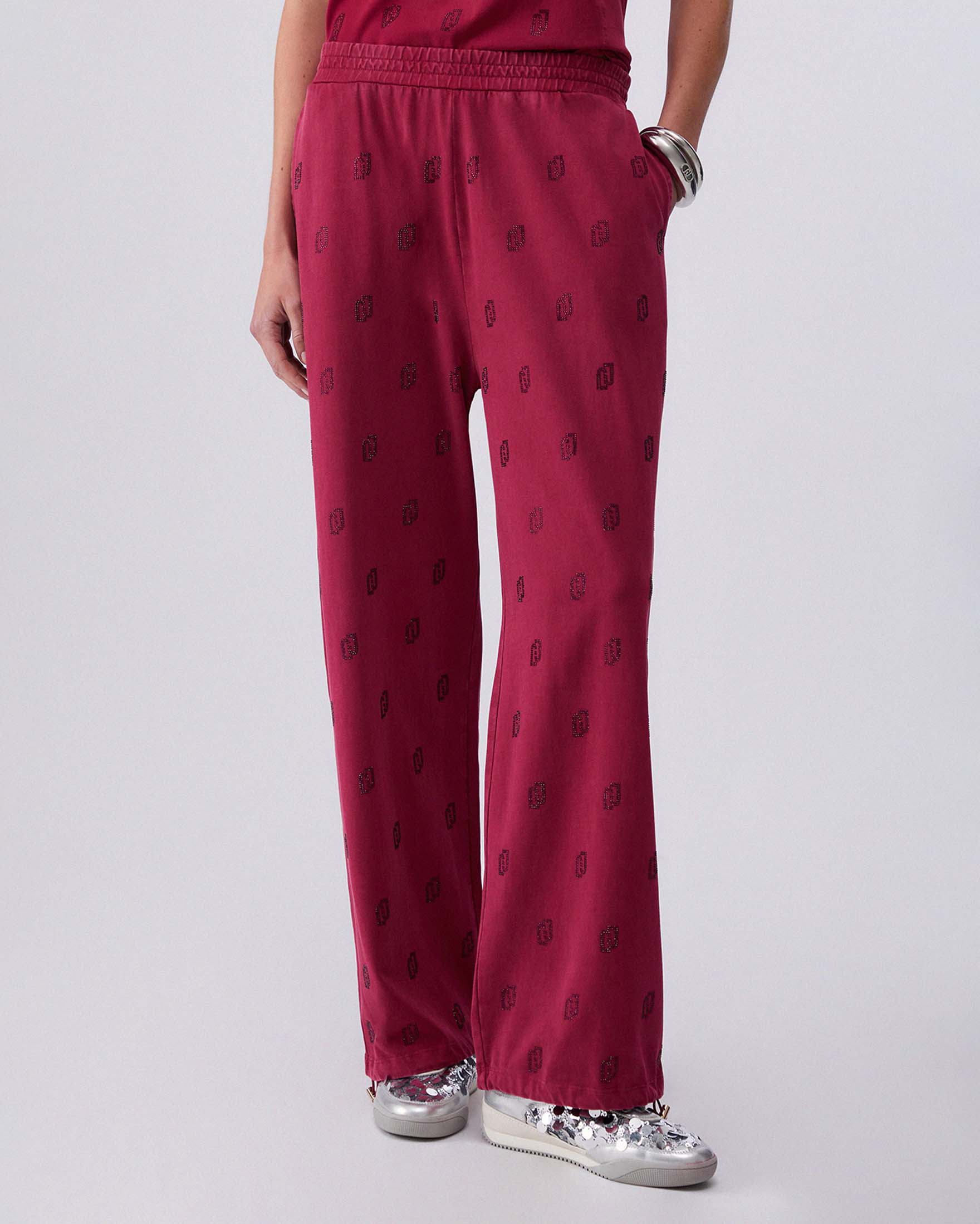 Pantaloni wide Liu Jo Sport ciclamino in jersey délavé con logo strass all over image