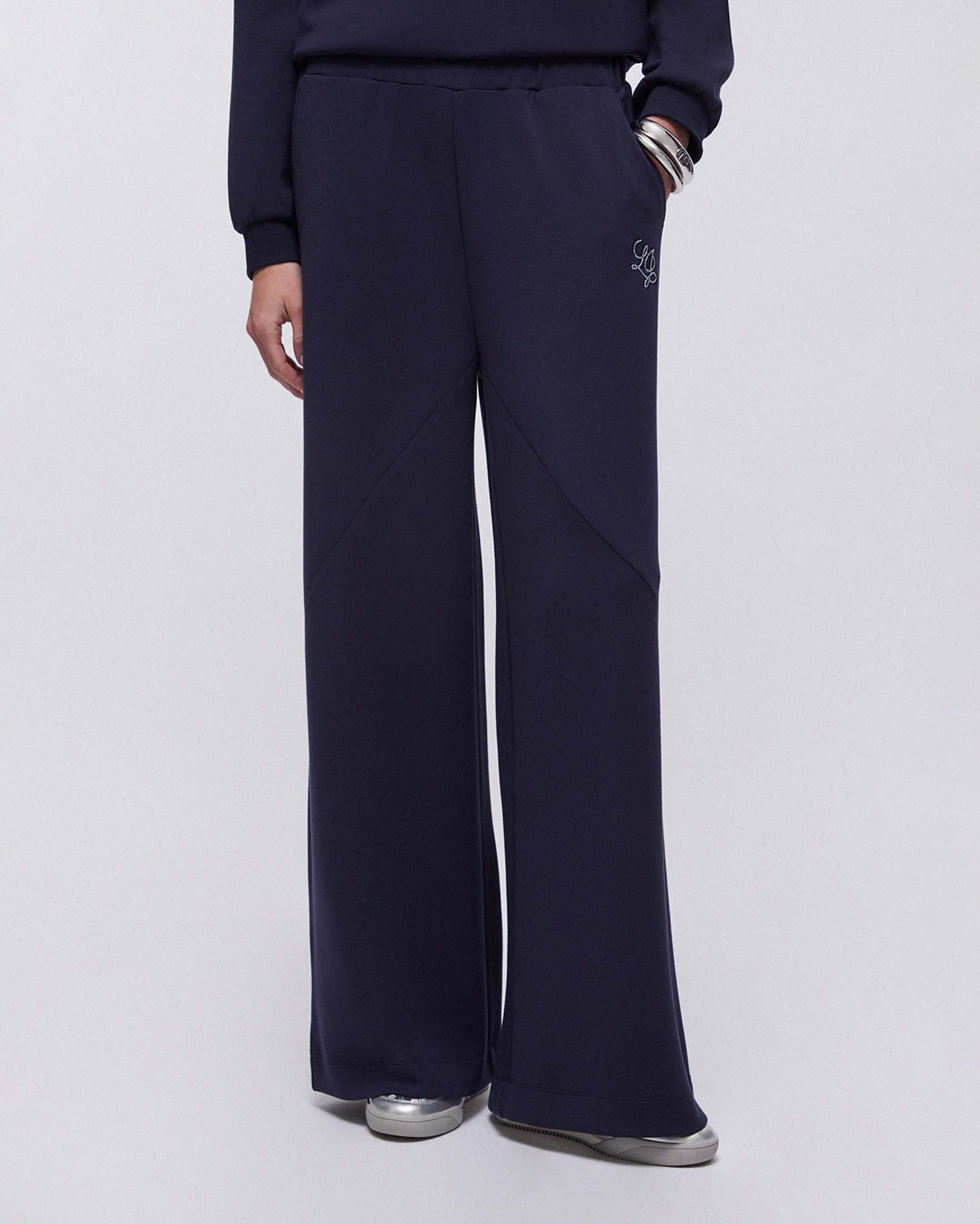 Pantaloni a palazzo Liu Jo Sport blu in scuba di misto modal con logo ricamato e tasche laterali image