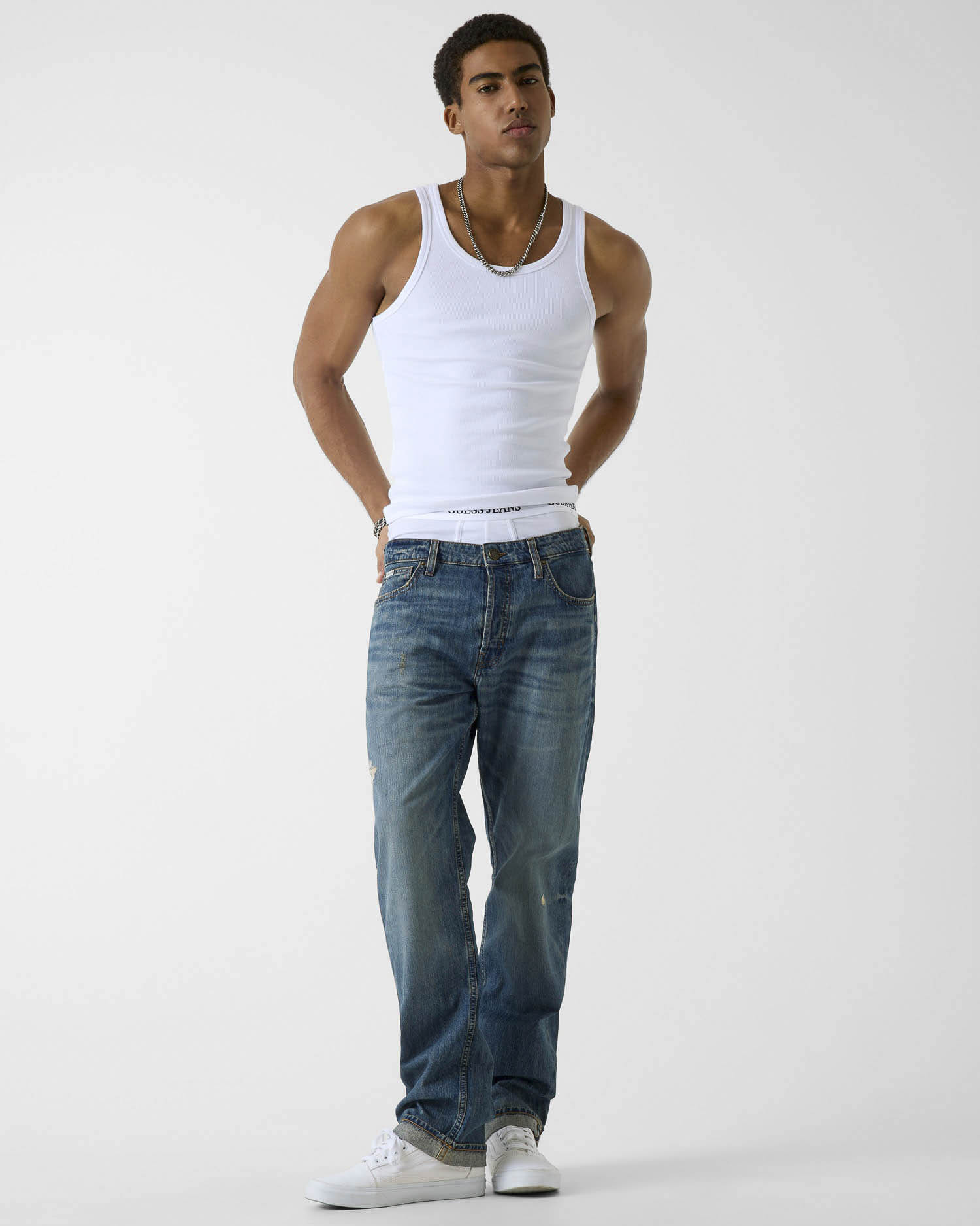 Guess Jeans lavaggio medio sabbiato in cotone con patch logo