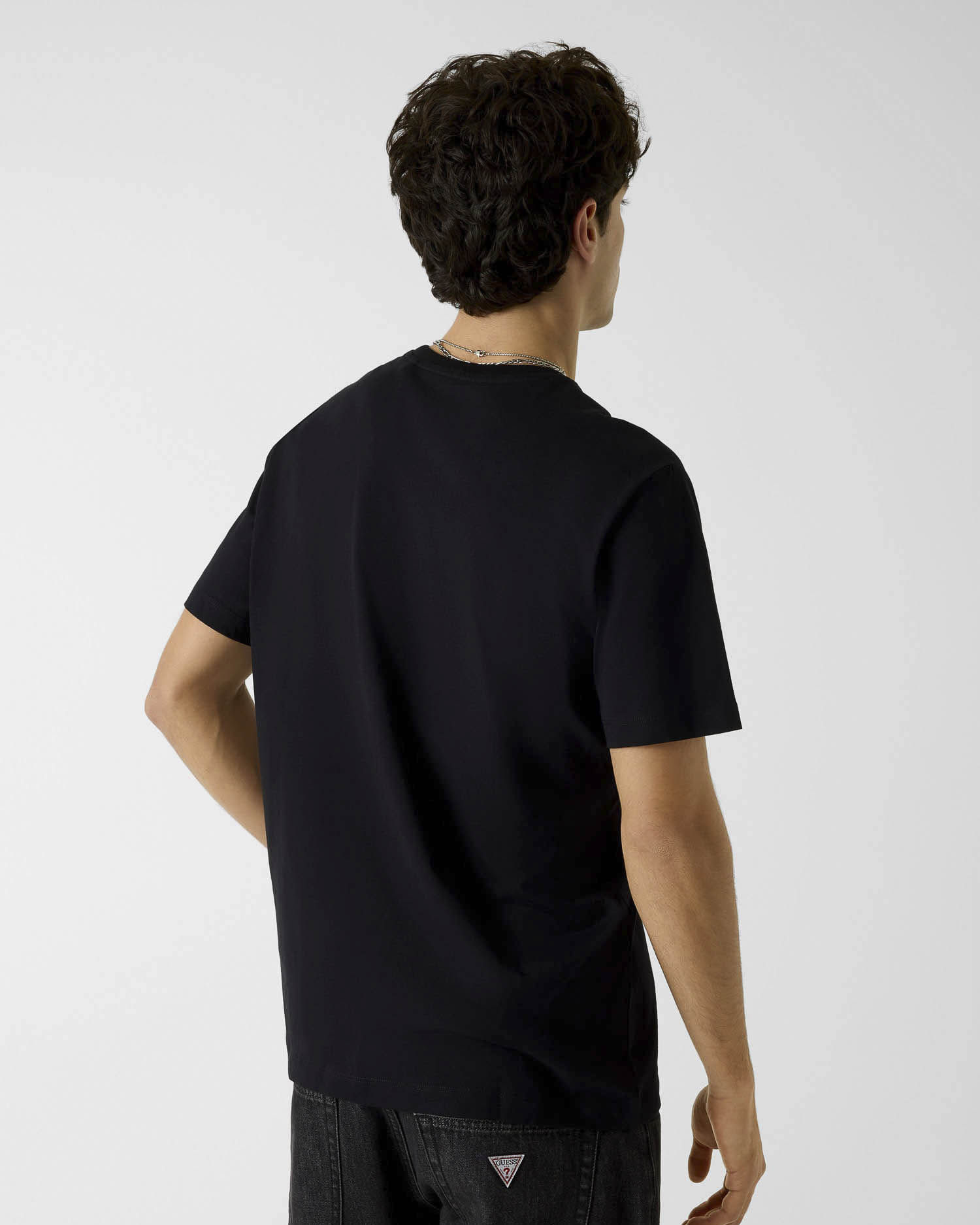T-shirt Guess Jeans nera in cotone con logo ricamato image