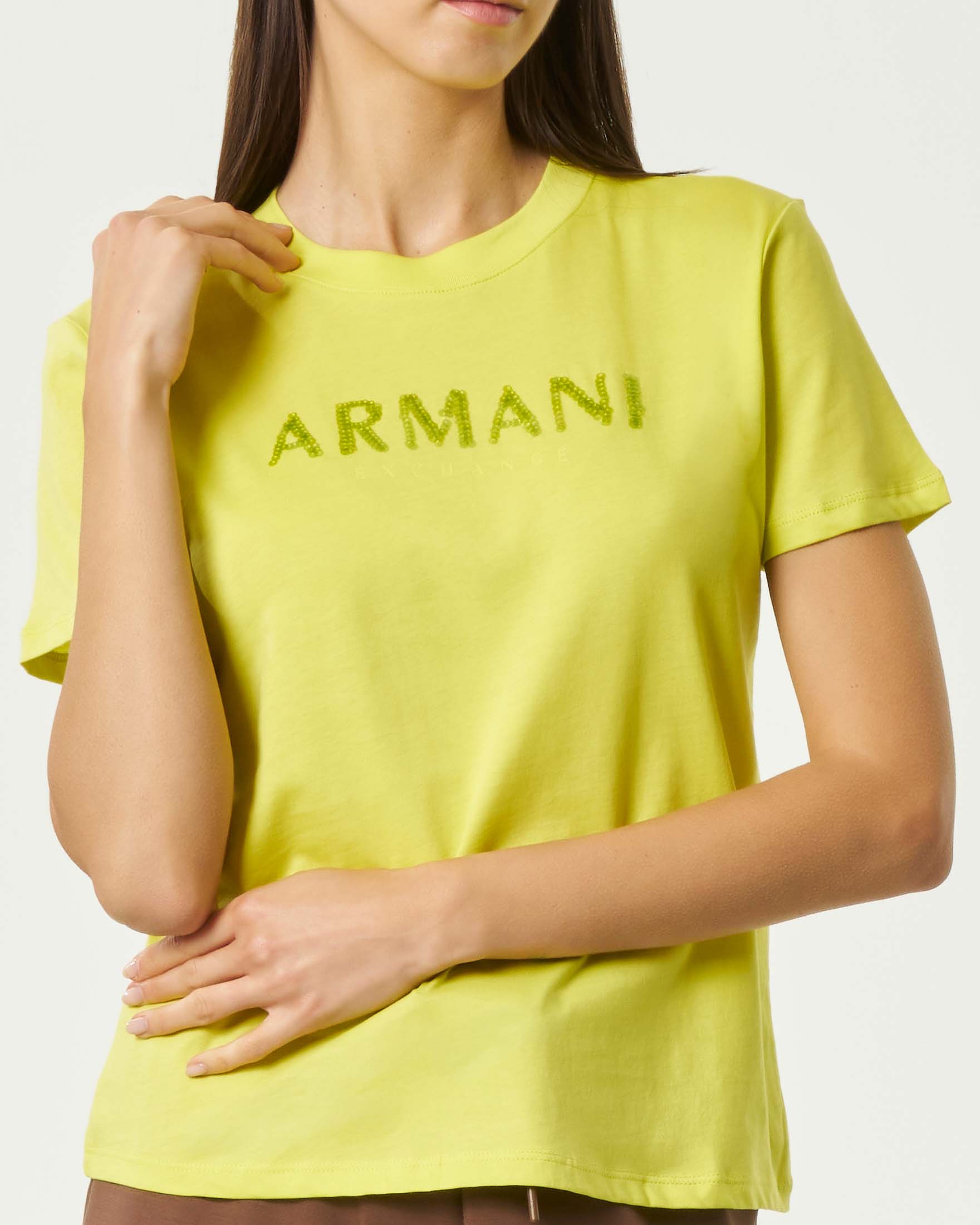 T-shirt girocollo Armani Exchange color lime in puro cotone con logo in paillettes e maniche corte image