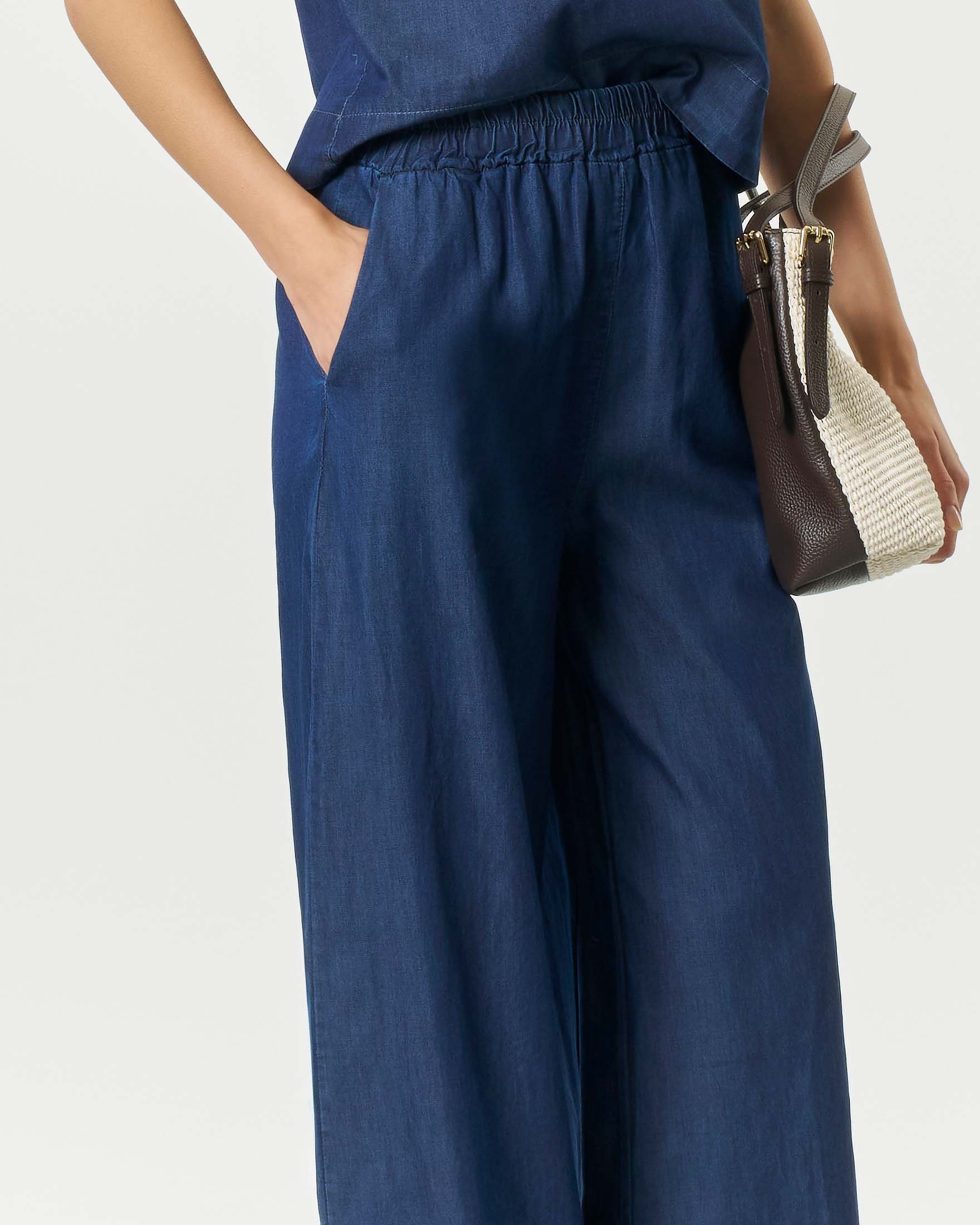 Pantaloni palazzo Hlo blu denin in chambray di cotone con vita elasticizzata e tasche laterali image
