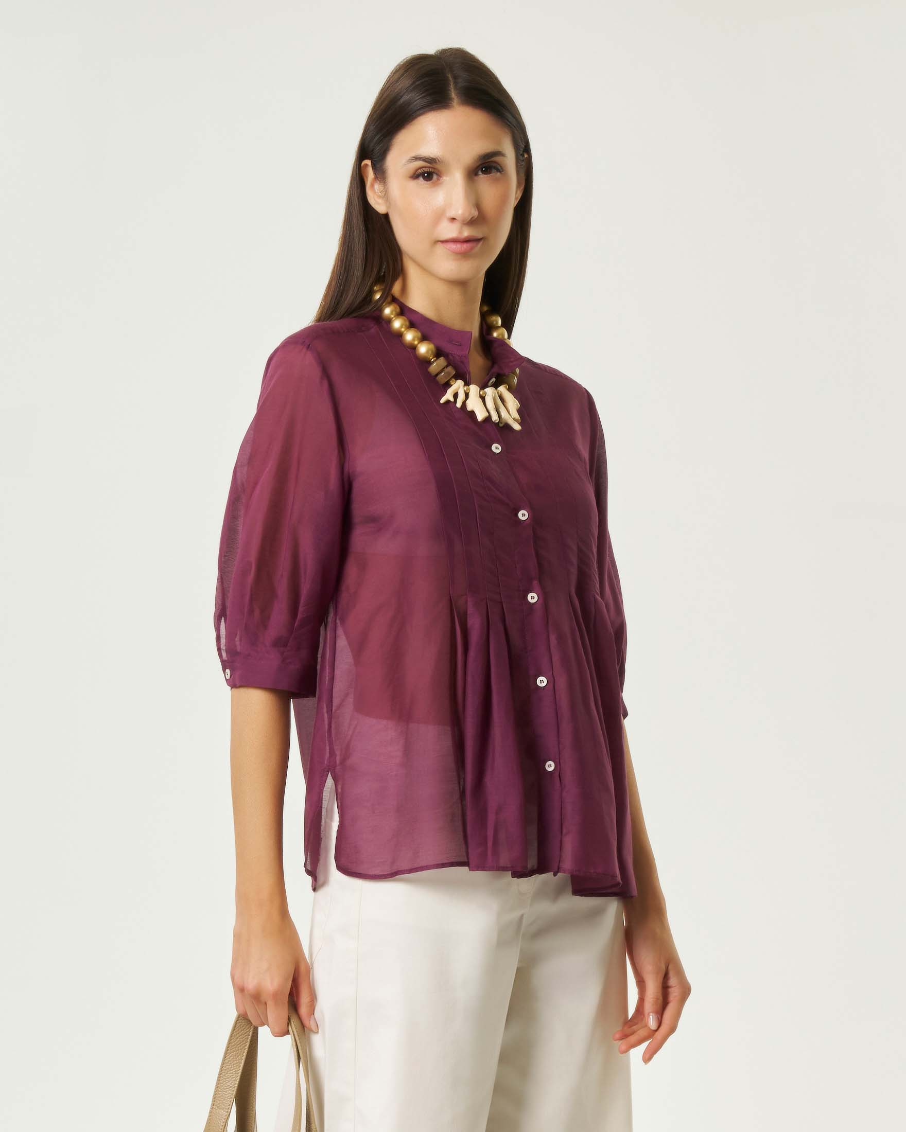 Blusa color prugna in mussola di cotone e seta con pieghe frontali