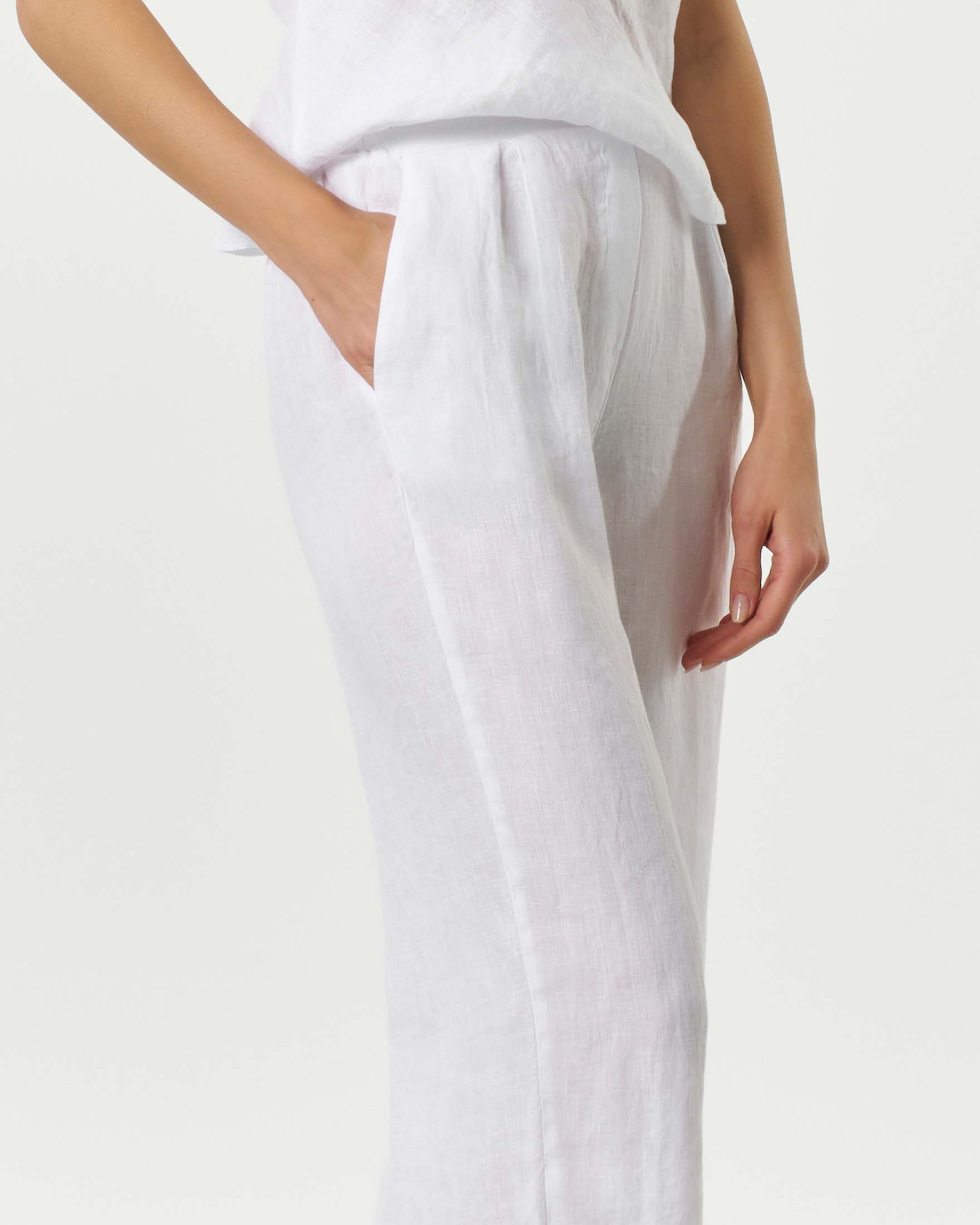 Pantaloni palazzo bianchi in lino con elastico inserito in vita