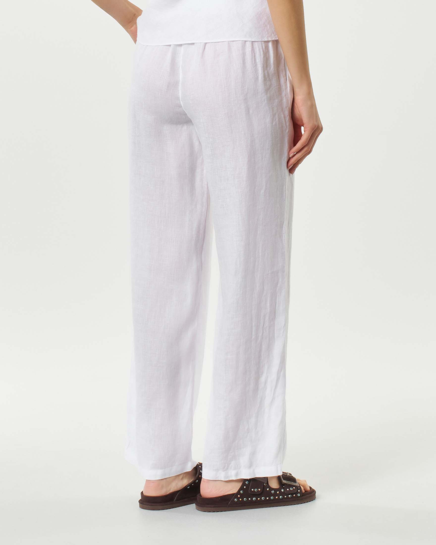 Pantaloni palazzo bianchi in lino con elastico inserito in vita