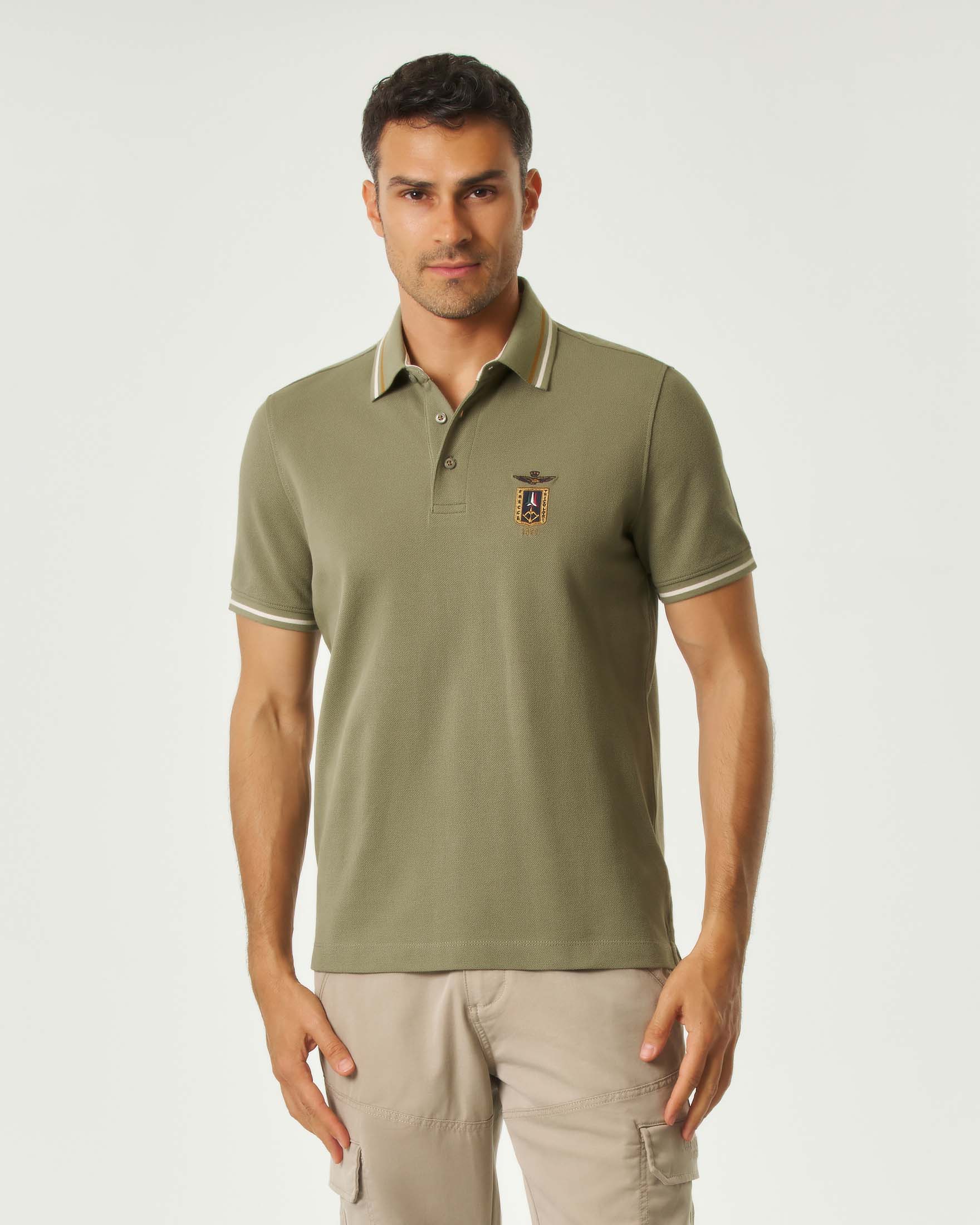 Polo verde salvia in piqué di puro cotone con patch Frecce Tricolori e aquila turrita