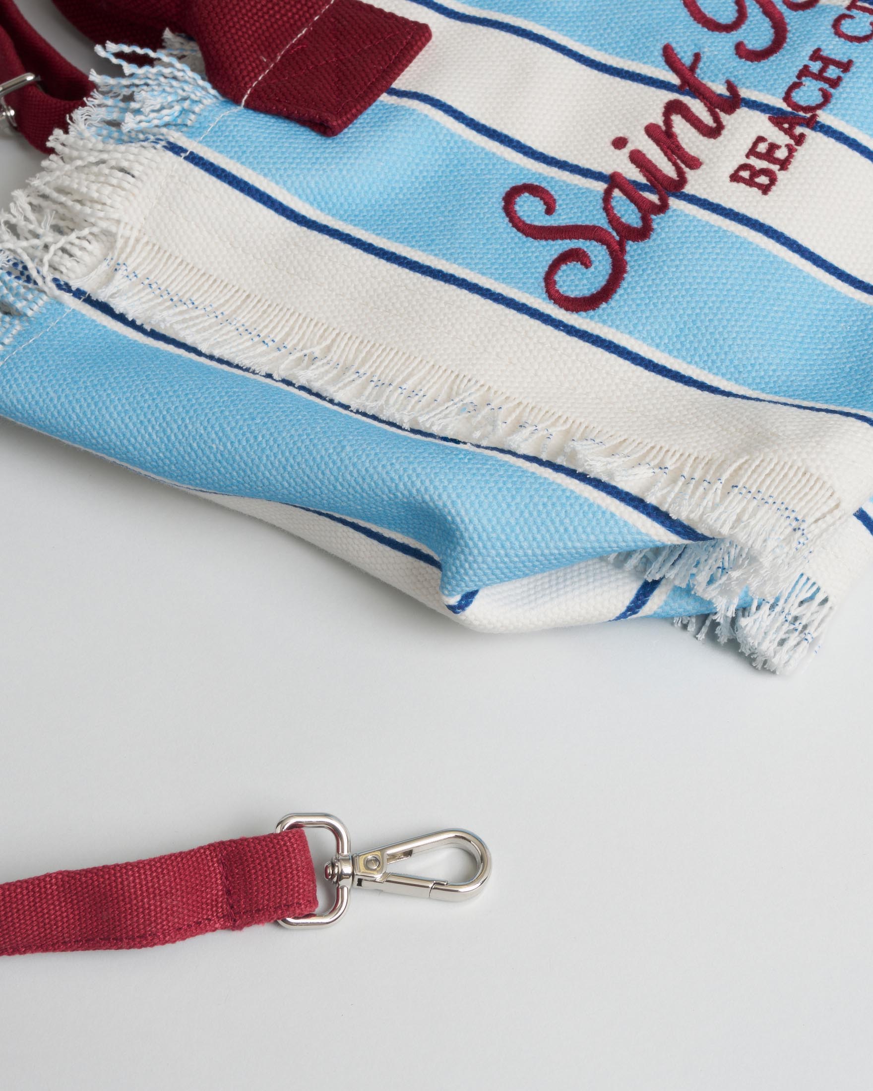 Colette MC2 Saint Barth in cotone a righe azzurre e bianche con frange e scritta logo bordeaux image