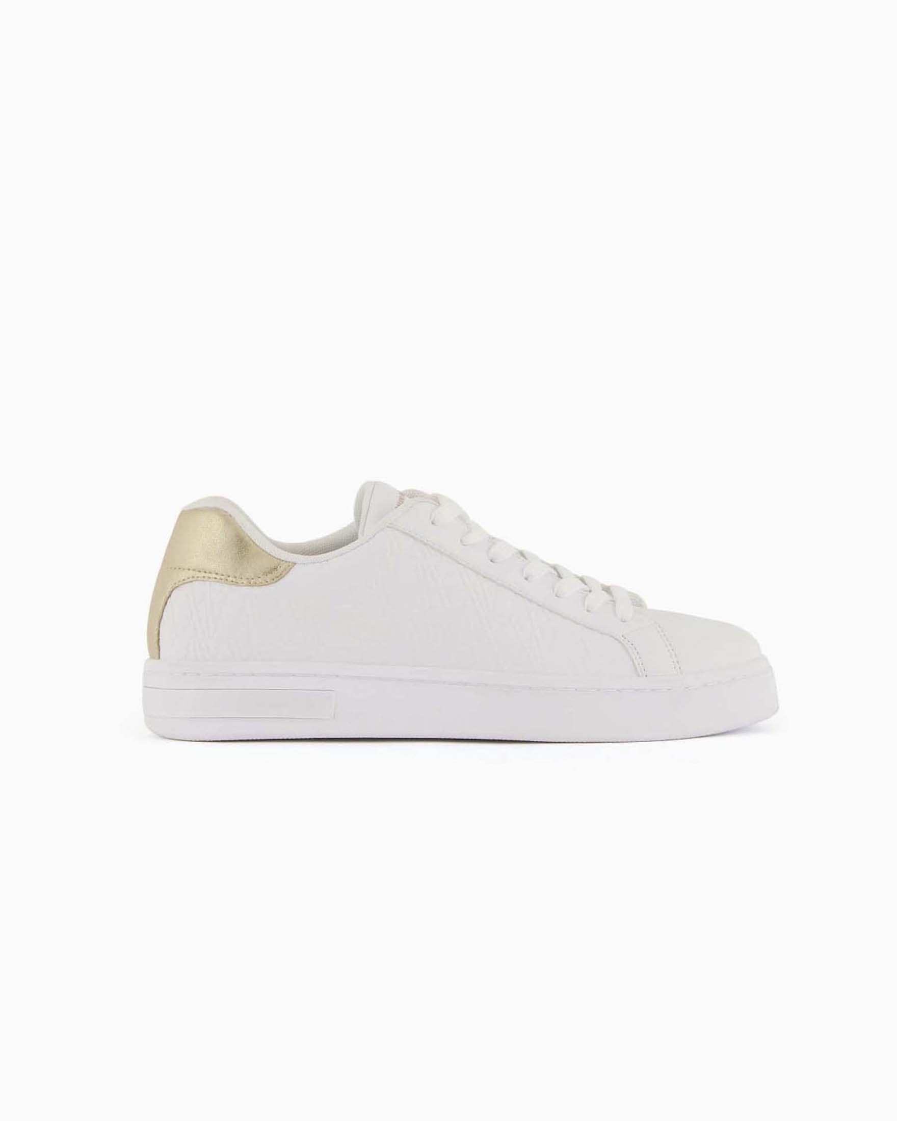 Sneakers Platform Exchange nere in similpelle con logo all over e inserto dorato sul retro