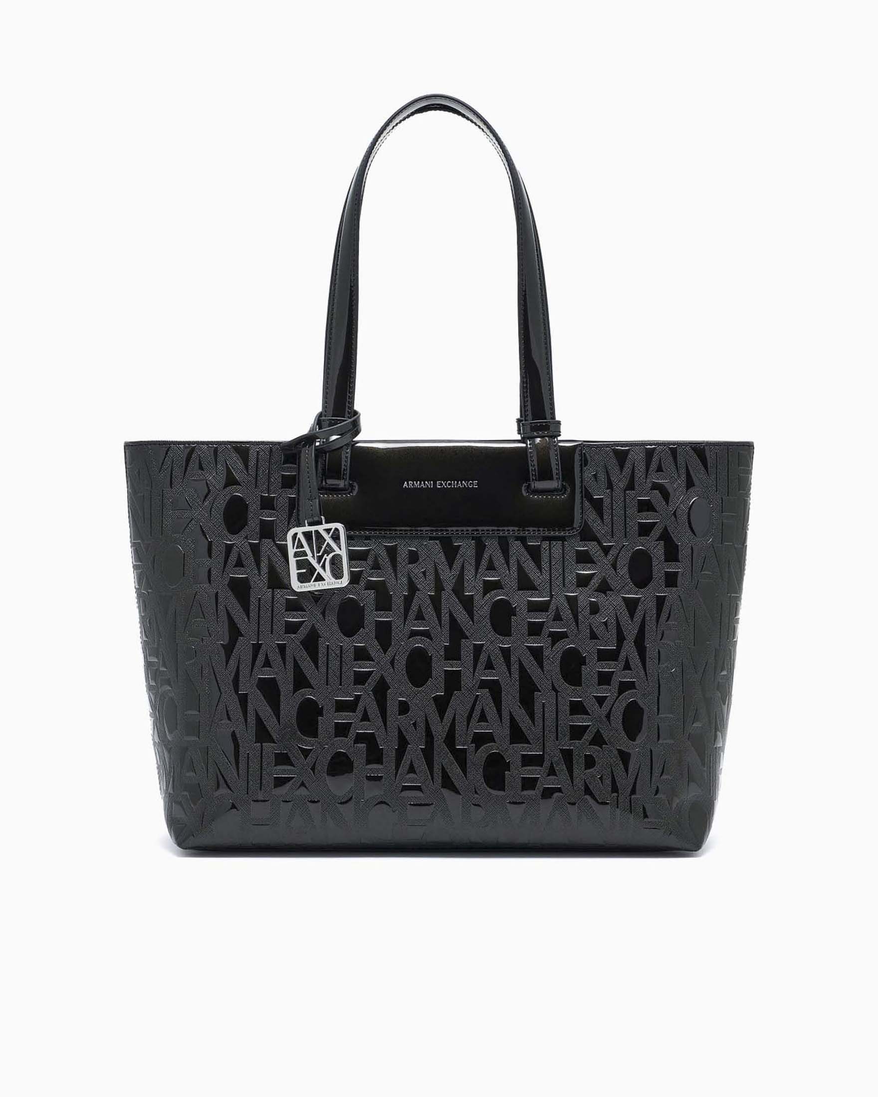 Shopping bag Exchange nera in similpelle con lettering logo all over in rilievo