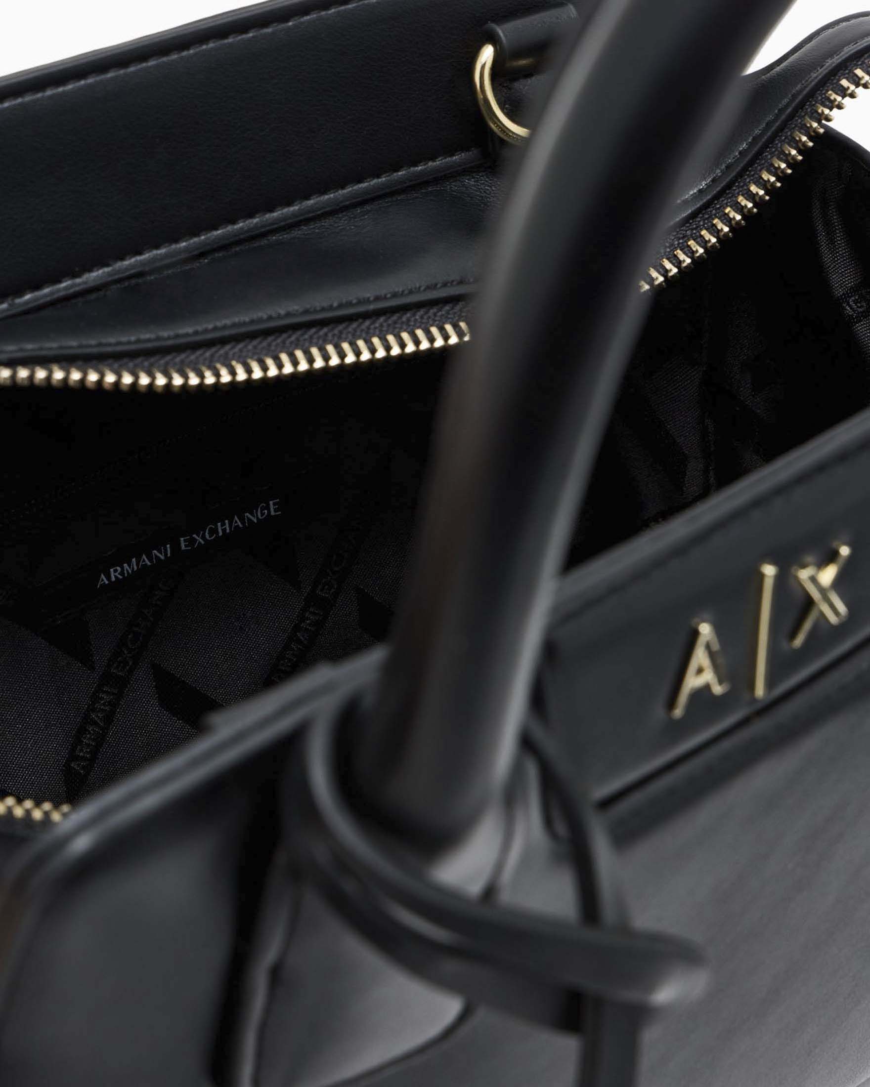 Borsa a mano piccola Armani Exchange nera a trapezio in similpelle con tracolla removibile image