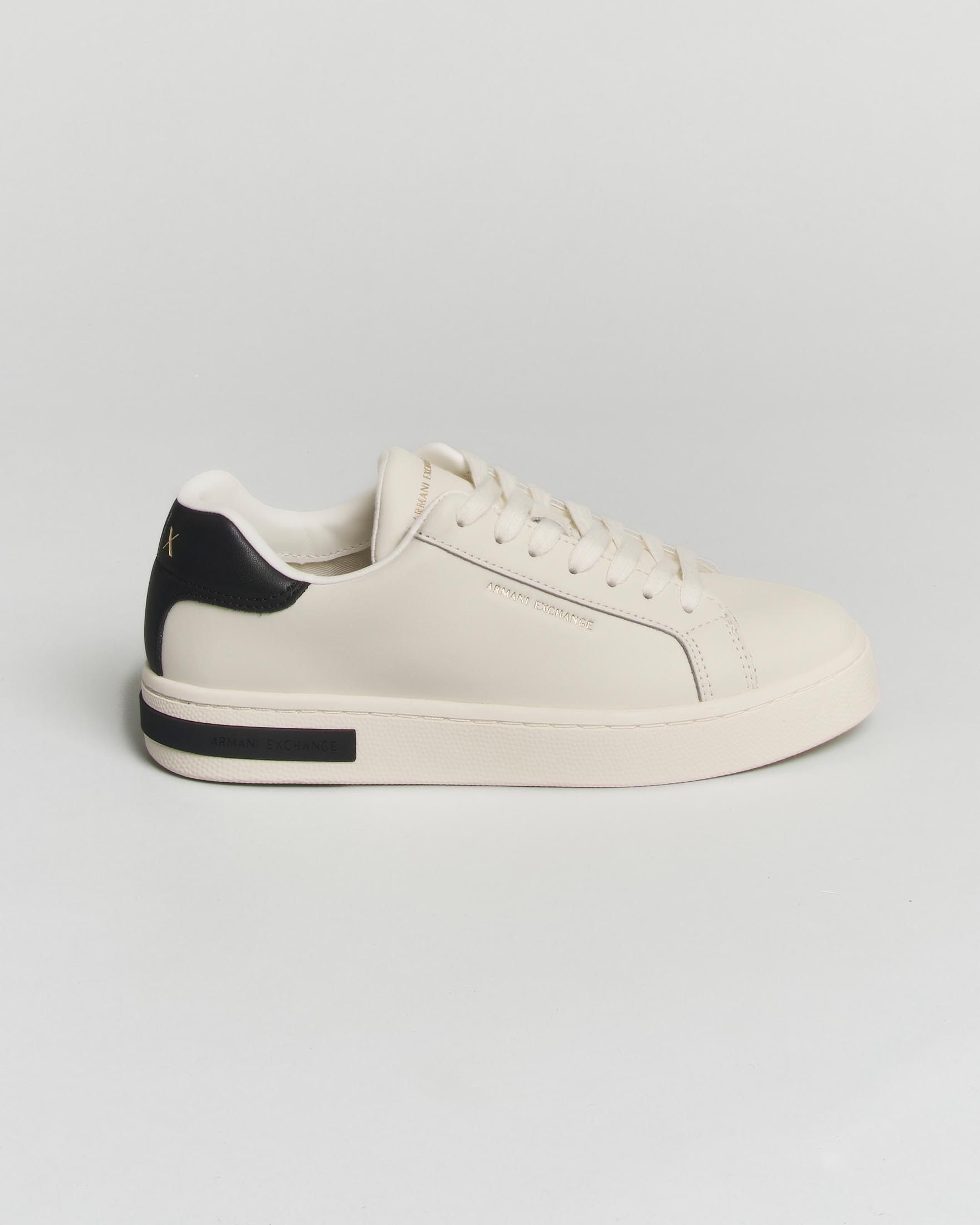 Sneakers Exchange bianche in pelle liscia con lacci e dettagli a contrasto neri
