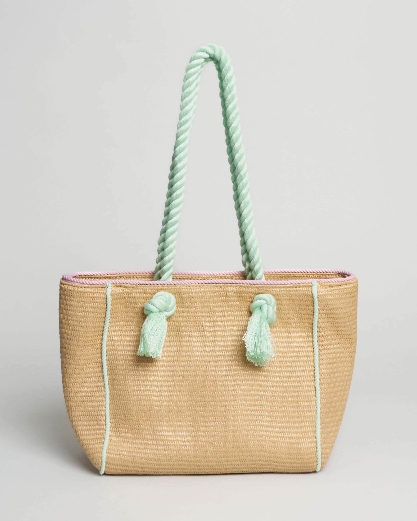 Borsa shopper Guess in rafia con manici verde acqua e scritta logo lilla