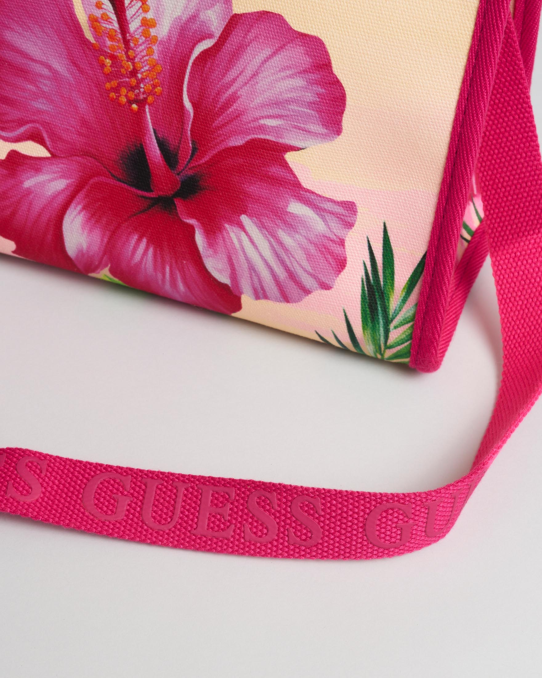 Borsa tote Guess fucsia in tela di cotone con stampa fiori e logo a triangolo