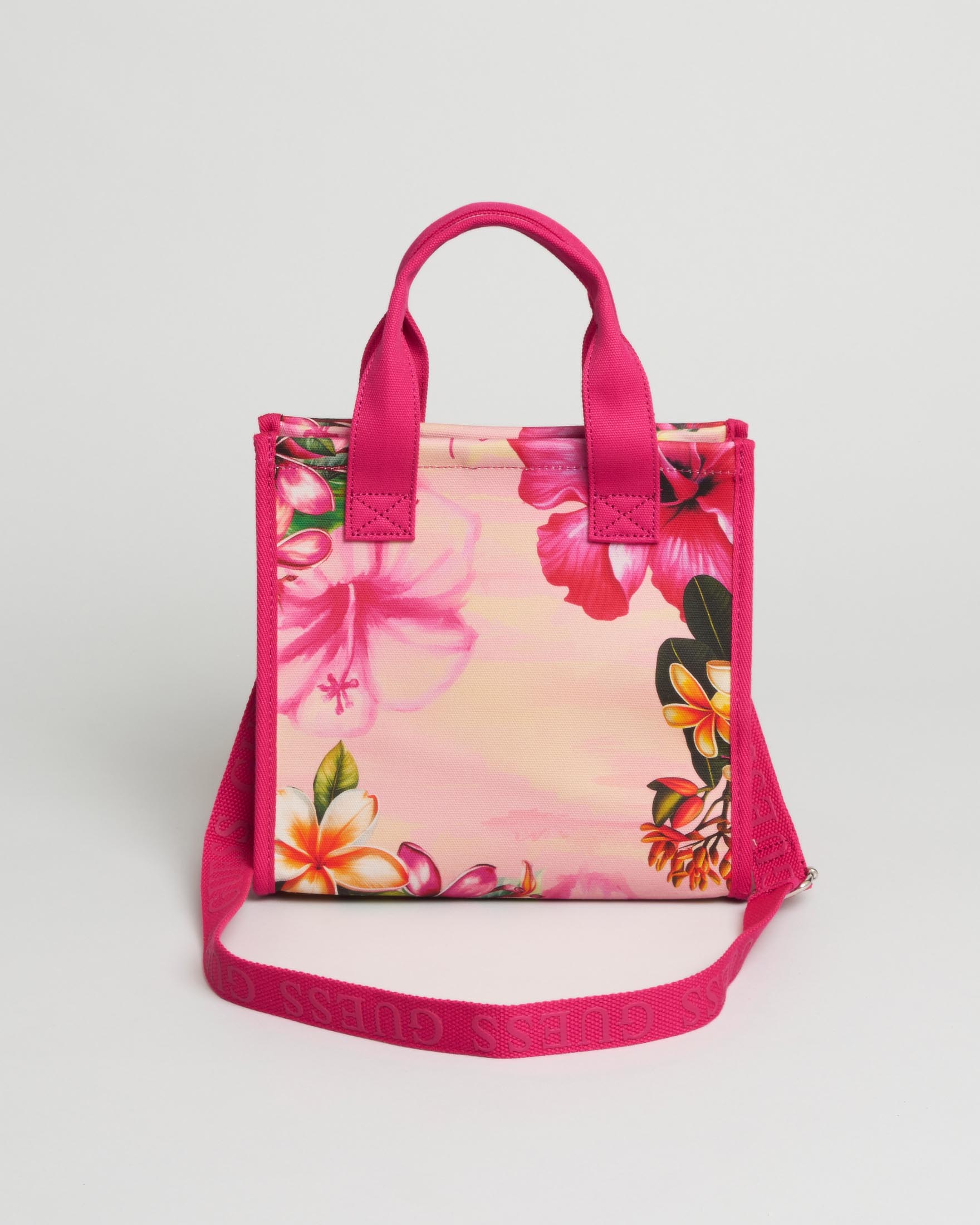 Borsa tote Guess fucsia in tela di cotone con stampa fiori e logo a triangolo