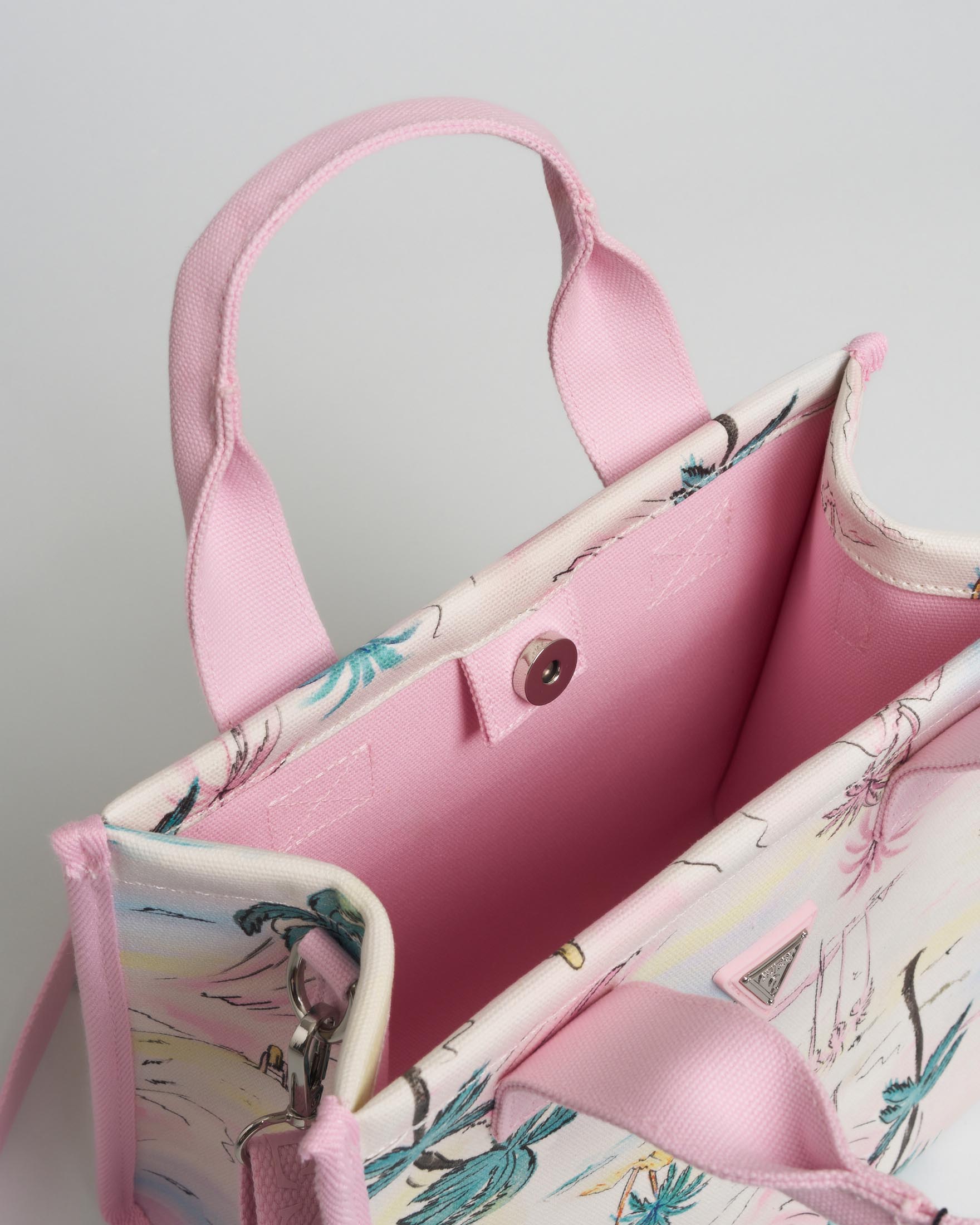 Borsa tote Guess rosa in tela di cotone con stampa palme e logo a triangolo