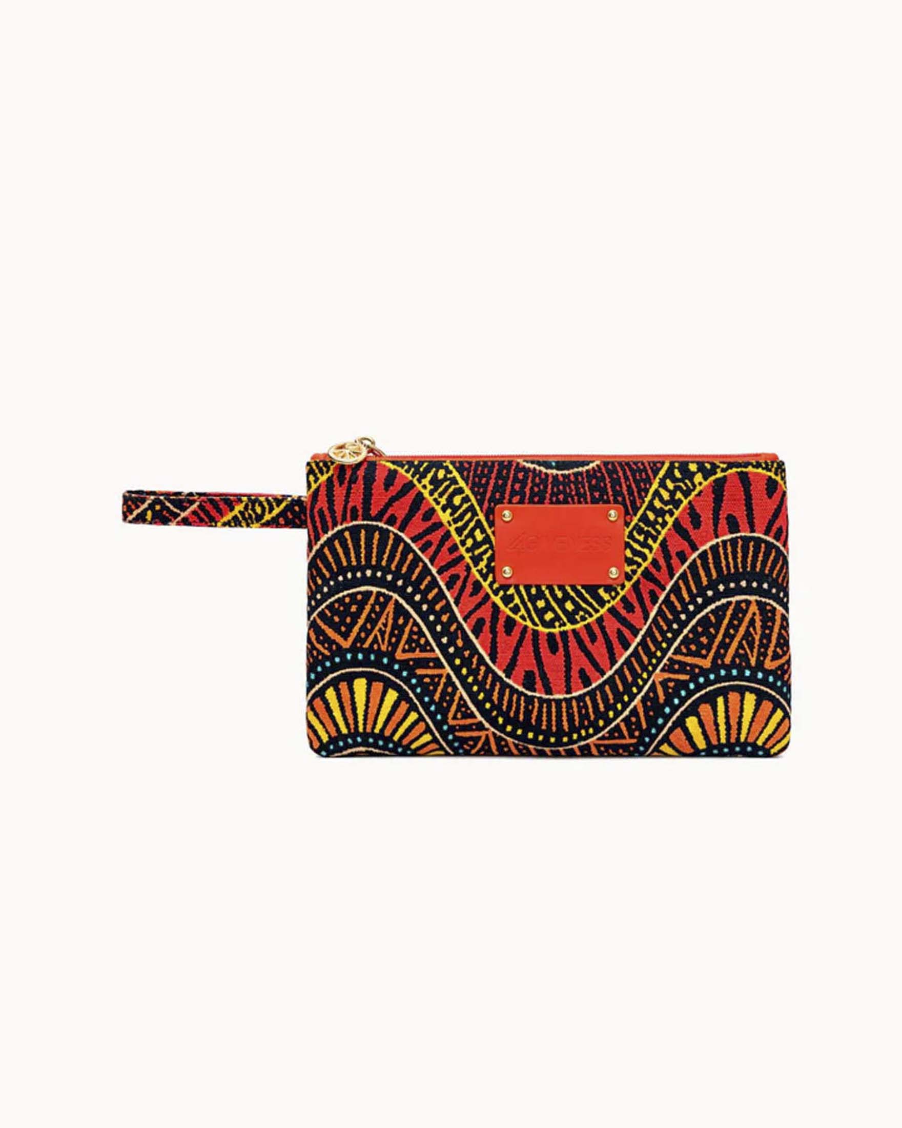 Pochette mare grande in polycanvas stampato con fantasia etnica e manico da polso